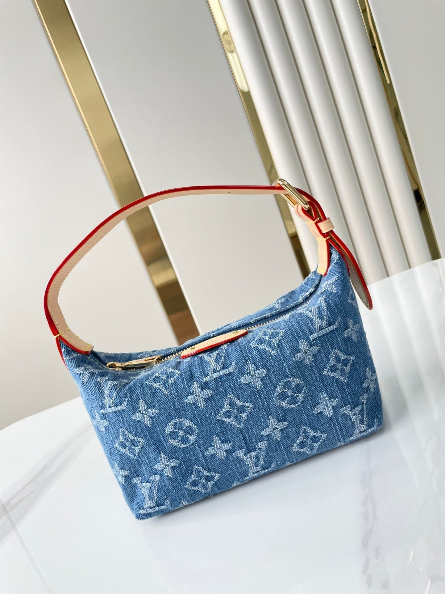 HILLS POCHETTE 18 IN BLUE MONOGRAM DENIM