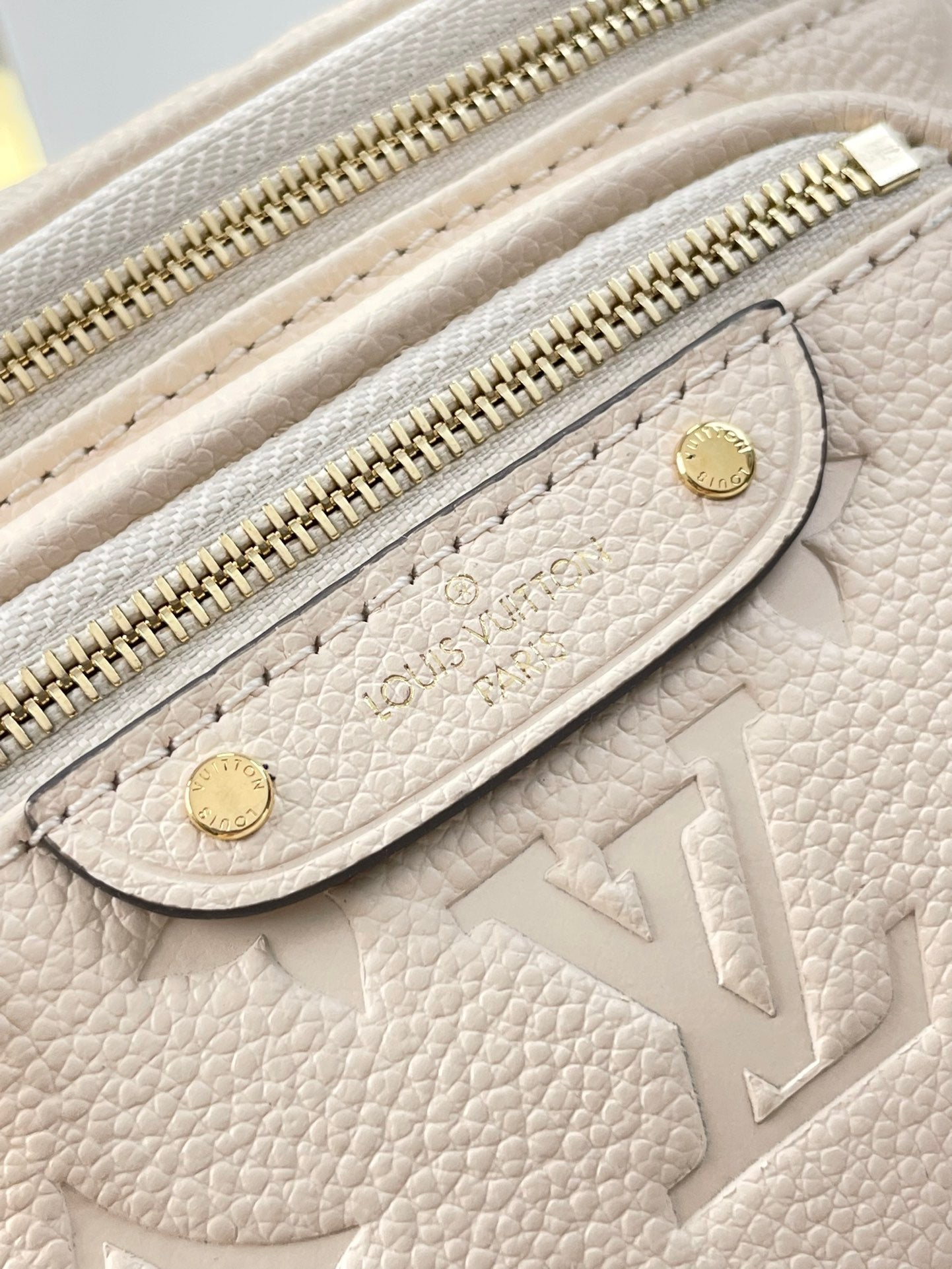 MINI BUMBAG 17 IN CREAM MONOGRAM EMPREINTE LEATHER GOLD HARDWARE