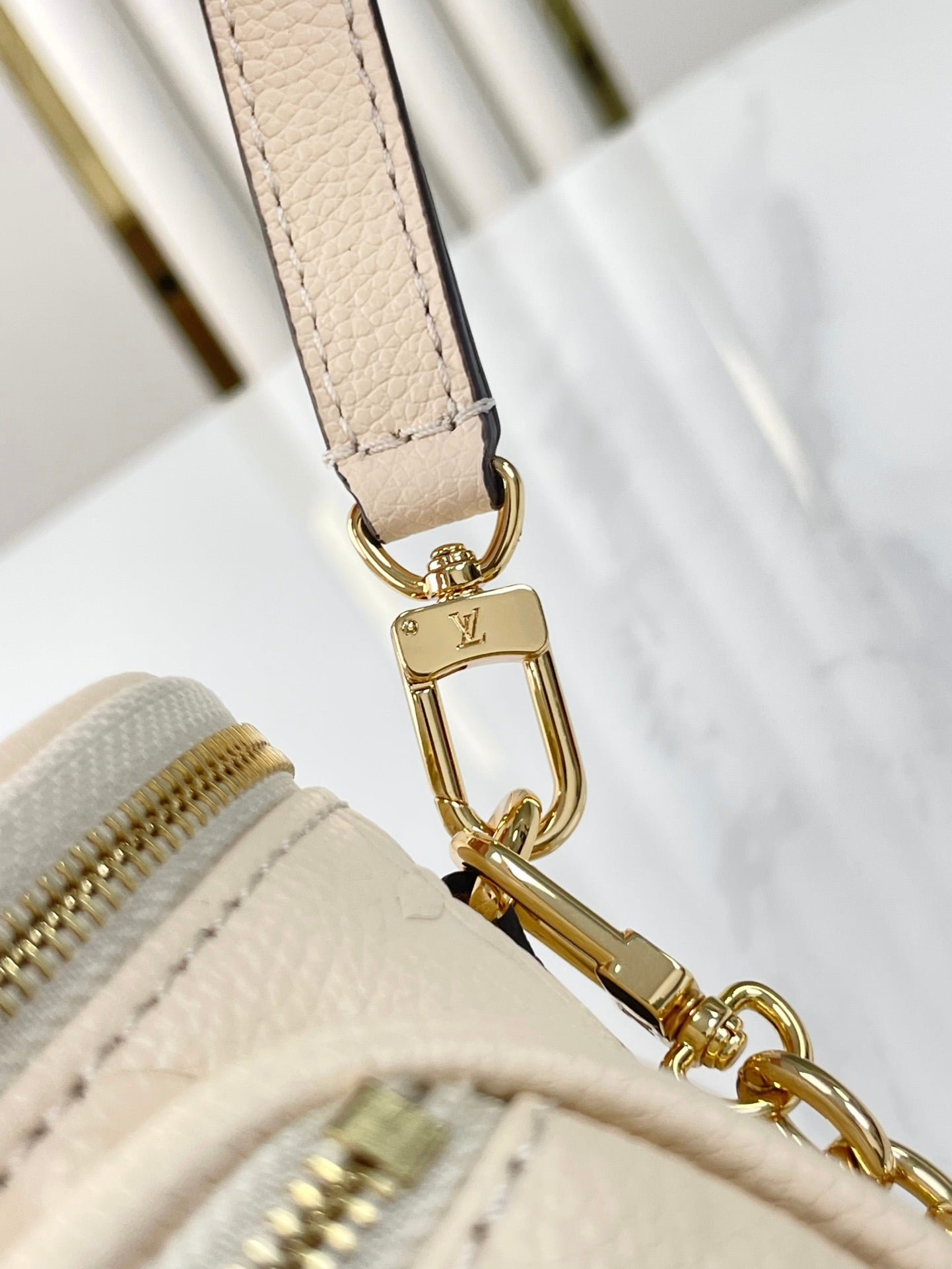 MINI BUMBAG 17 IN CREAM MONOGRAM EMPREINTE LEATHER GOLD HARDWARE