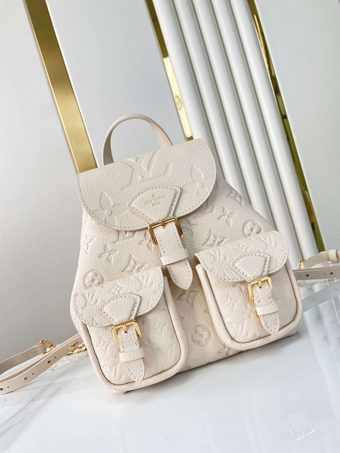 BACKUP BACKPACK 22 IN CREAM MONOGRAM EMPREINTE LEATHER