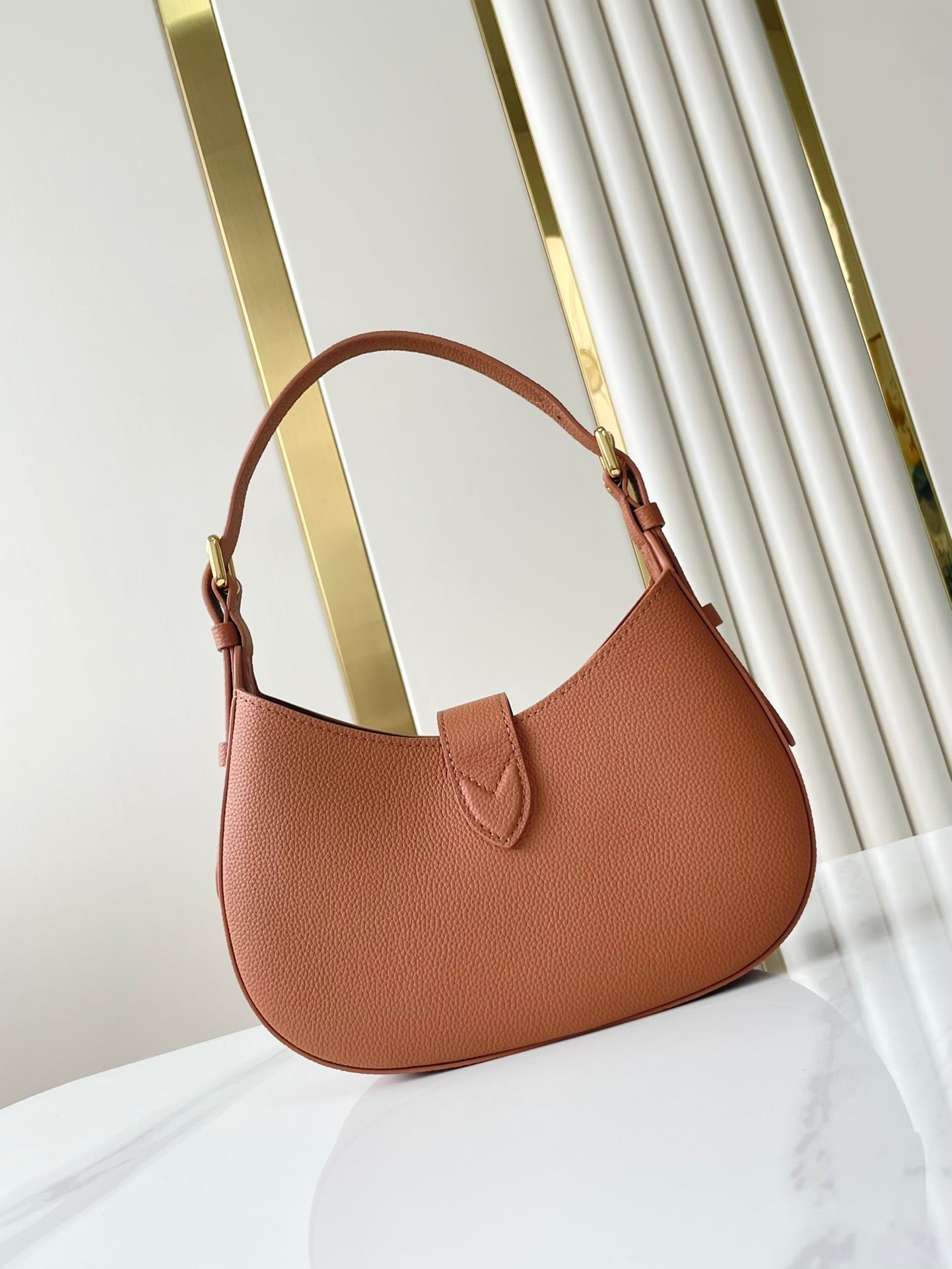 LOW KEY SHOULDER BAG 26 IN COGNAC GRAINED CALFSKIN GOLD BUCKLE