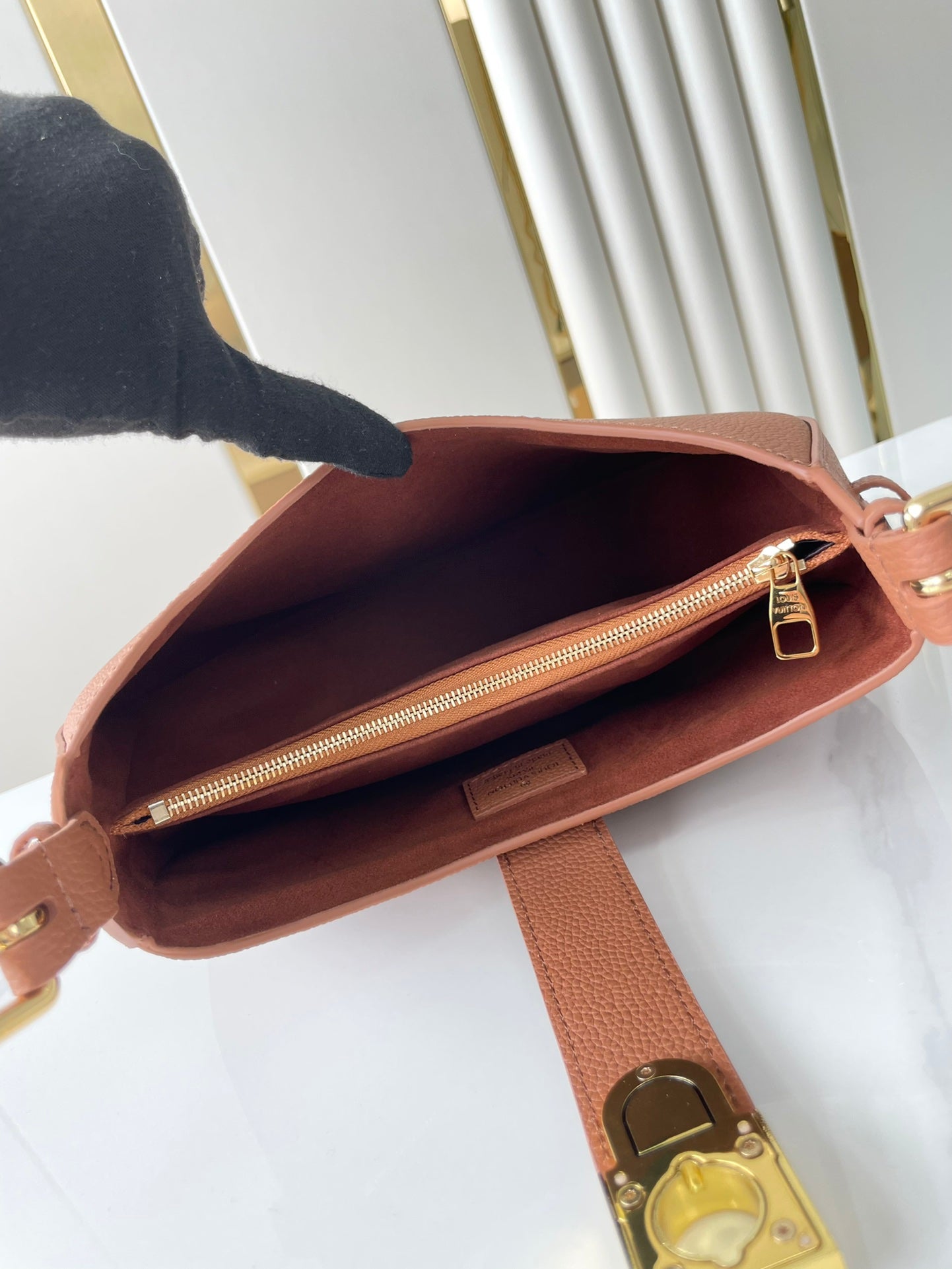 LOW KEY SHOULDER BAG 26 IN COGNAC GRAINED CALFSKIN GOLD BUCKLE