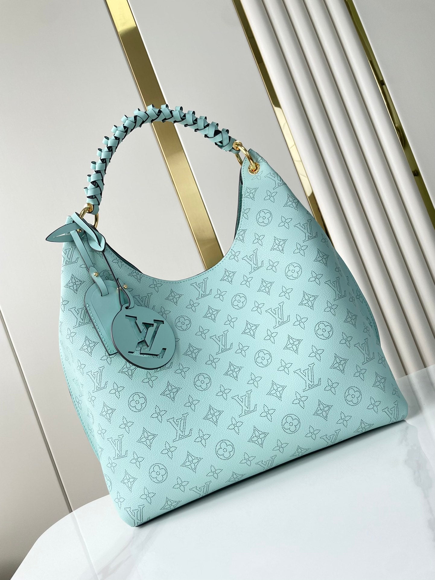 CARMEL 40 IN SKY BLUE MONOGRAM PERFORATED CALFSKIN