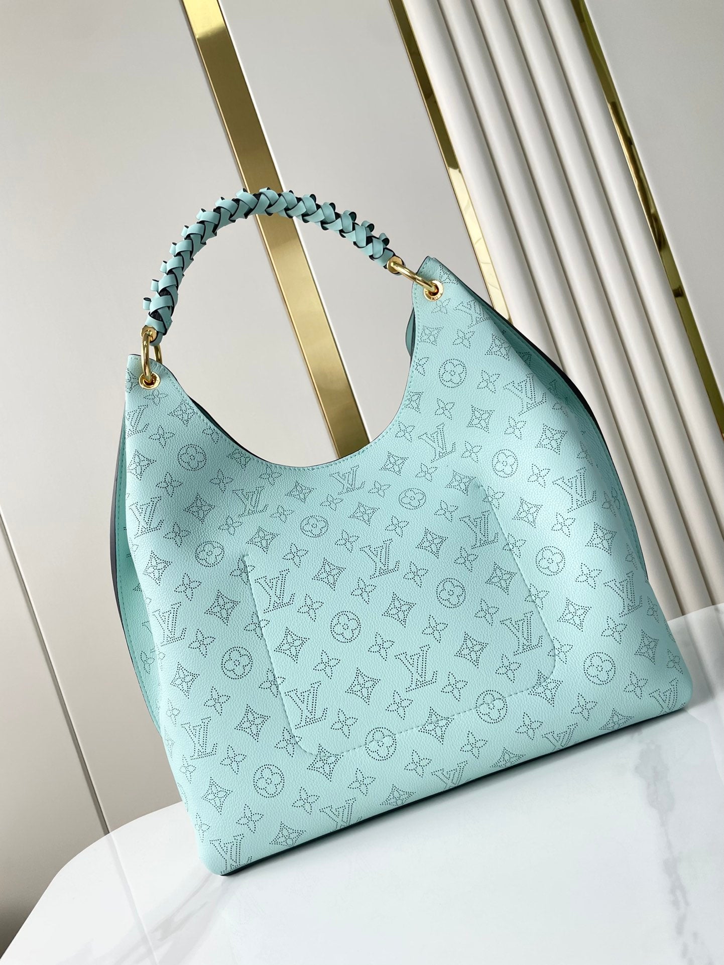 CARMEL 40 IN SKY BLUE MONOGRAM PERFORATED CALFSKIN