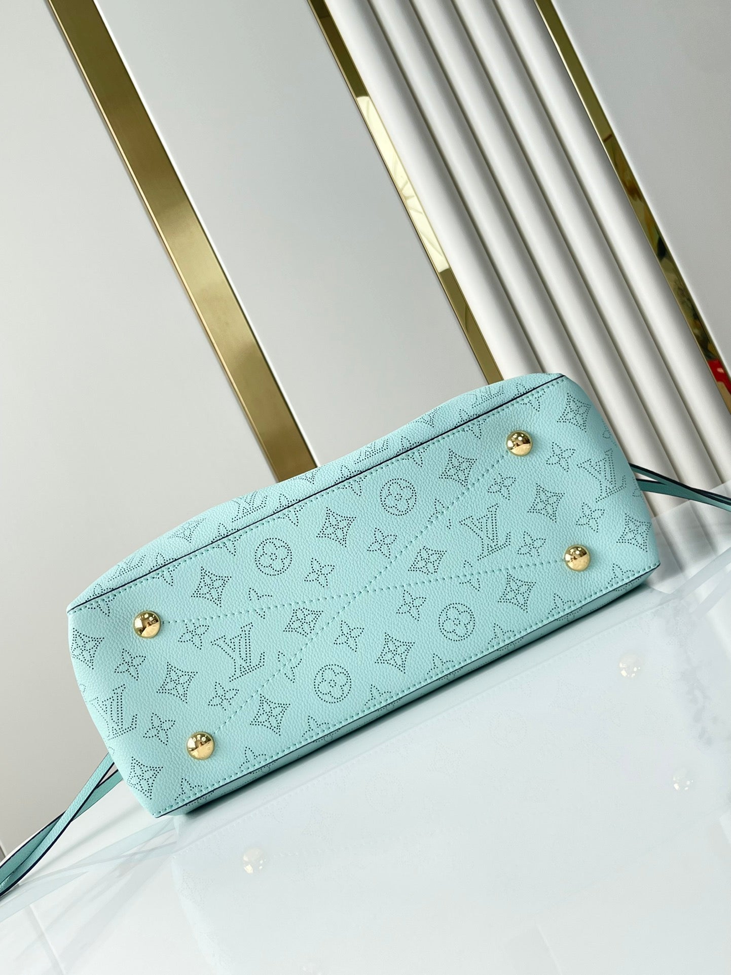 BELLA TOTE 32 IN SKY BLUE MONOGRAM PERFORATED CALFSKIN GOLD HARDWARE