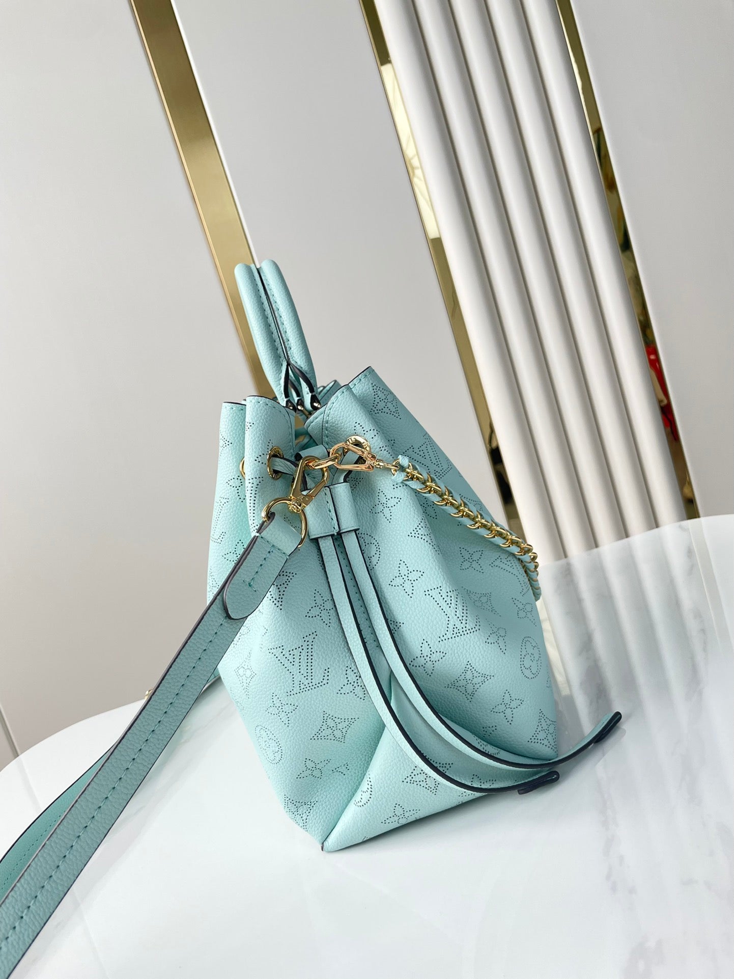 BELLA TOTE 32 IN SKY BLUE MONOGRAM PERFORATED CALFSKIN GOLD HARDWARE