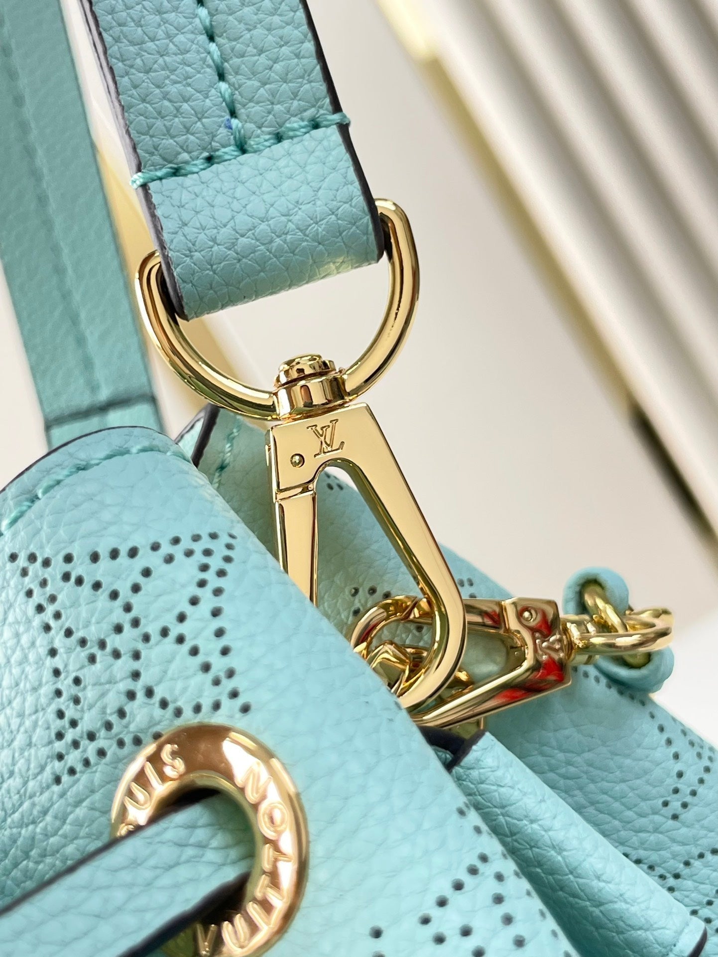 BELLA TOTE 32 IN SKY BLUE MONOGRAM PERFORATED CALFSKIN GOLD HARDWARE