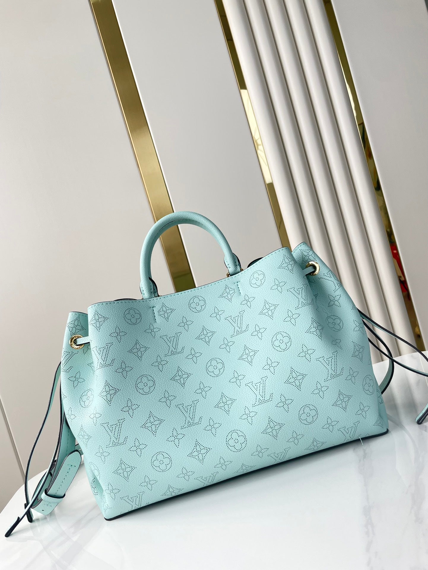 BELLA TOTE 32 IN SKY BLUE MONOGRAM PERFORATED CALFSKIN GOLD HARDWARE