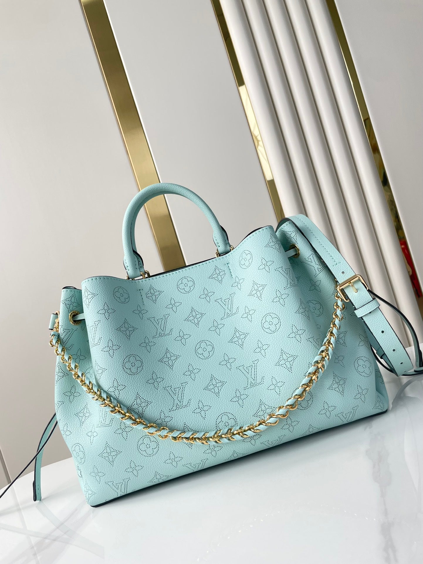 BELLA TOTE 32 IN SKY BLUE MONOGRAM PERFORATED CALFSKIN GOLD HARDWARE