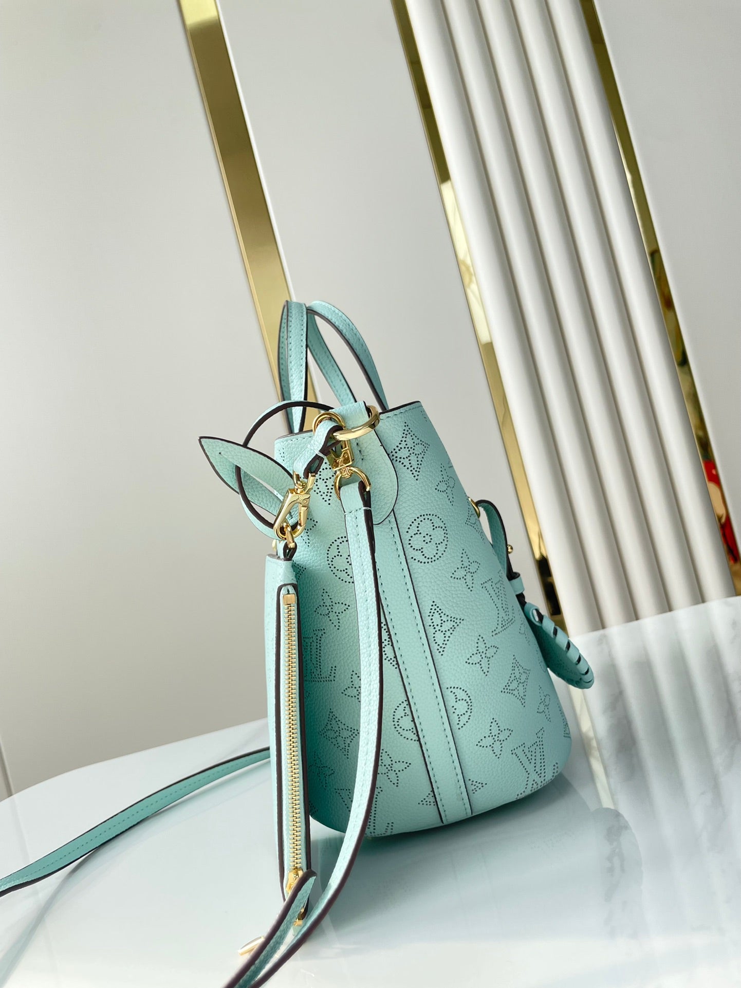 BLOSSOM PM 20 IN SKY BLUE MONOGRAM PERFORATED CALFSKIN