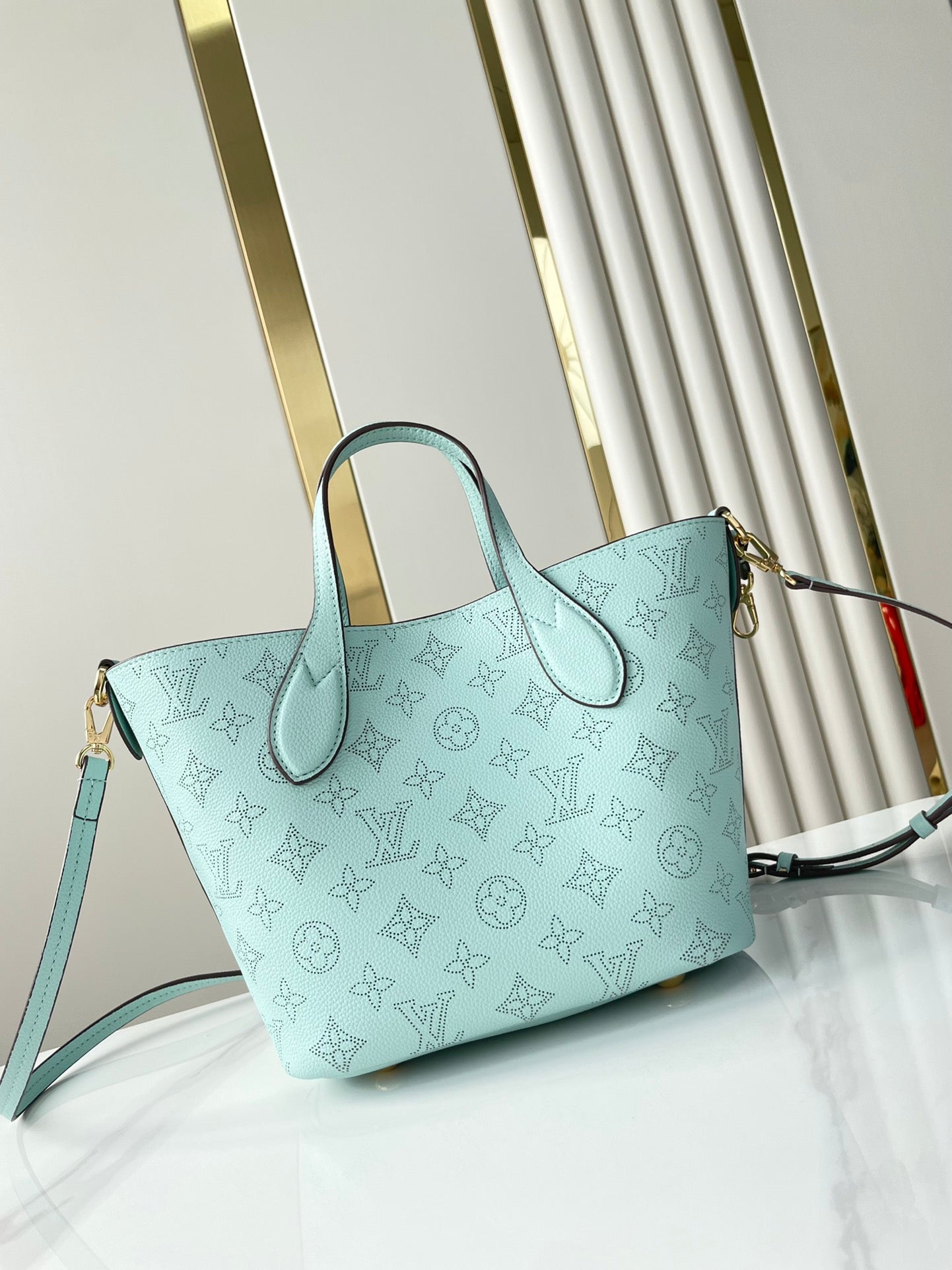 BLOSSOM PM 20 IN SKY BLUE MONOGRAM PERFORATED CALFSKIN