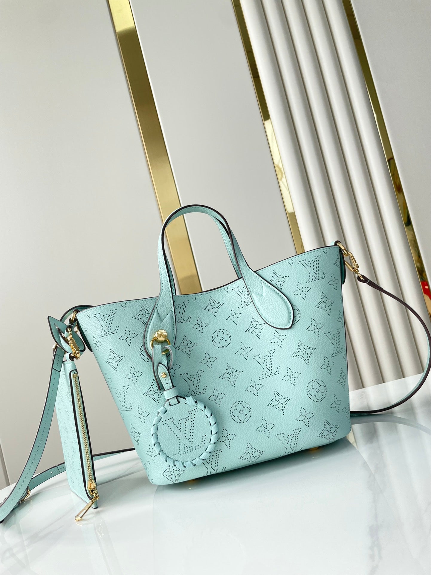 BLOSSOM PM 20 IN SKY BLUE MONOGRAM PERFORATED CALFSKIN