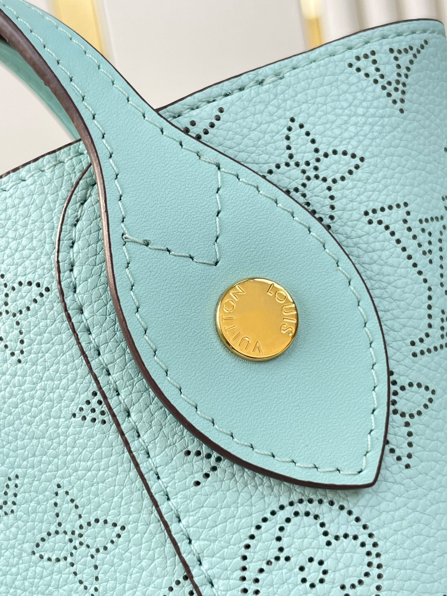 HINA 23 IN SKY BLUE MONOGRAM PERFORATED CALFSKIN