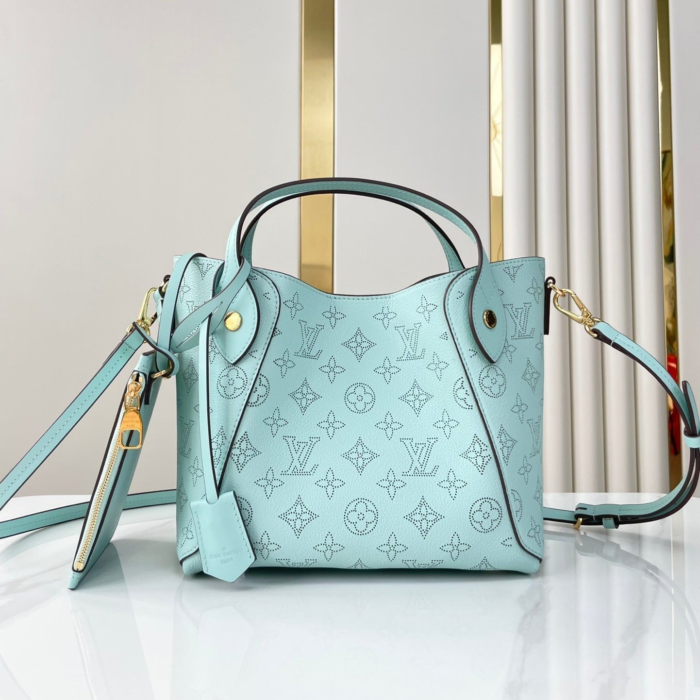 HINA 23 IN SKY BLUE MONOGRAM PERFORATED CALFSKIN