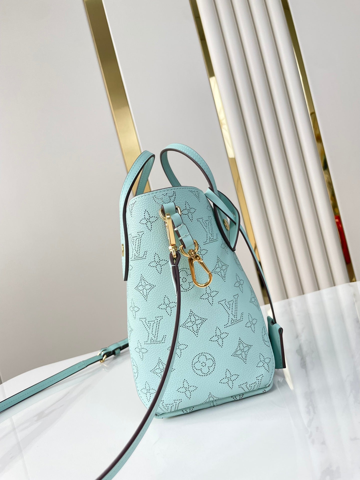 HINA 23 IN SKY BLUE MONOGRAM PERFORATED CALFSKIN