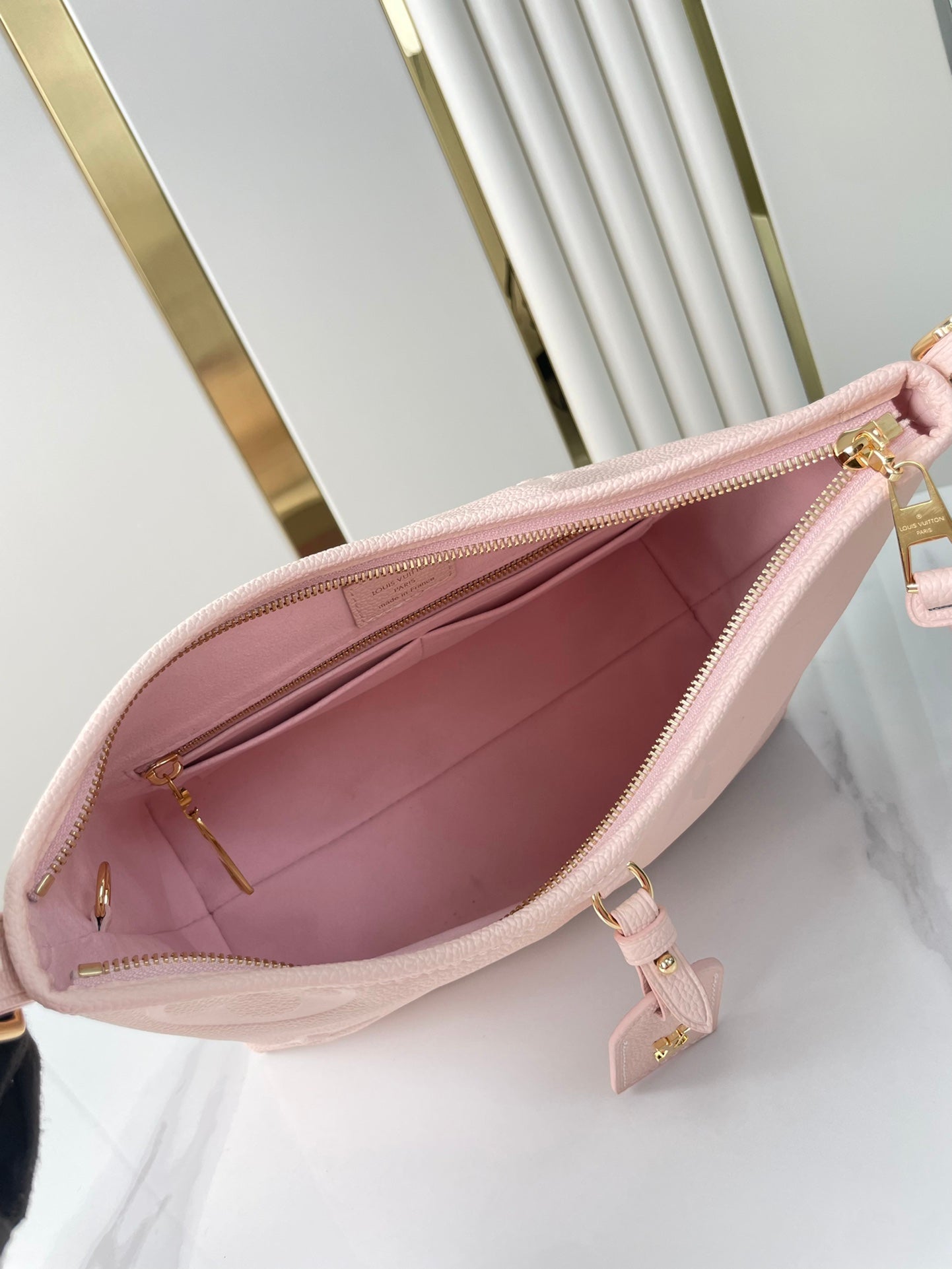 CARRYALL 29 IN LIGHT PINK MONOGRAM EMPREINTE LEATHER