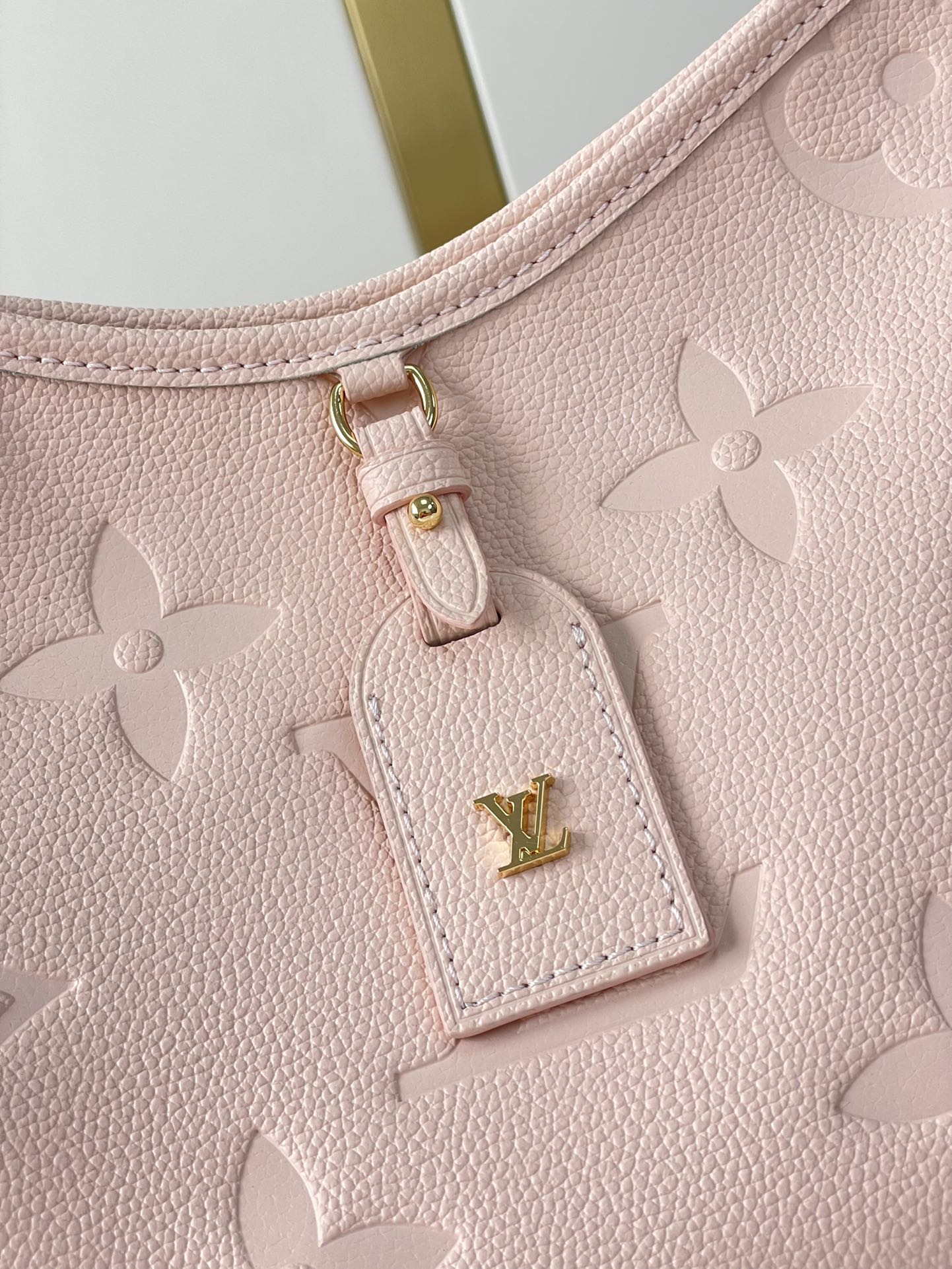 CARRYALL 29 IN LIGHT PINK MONOGRAM EMPREINTE LEATHER