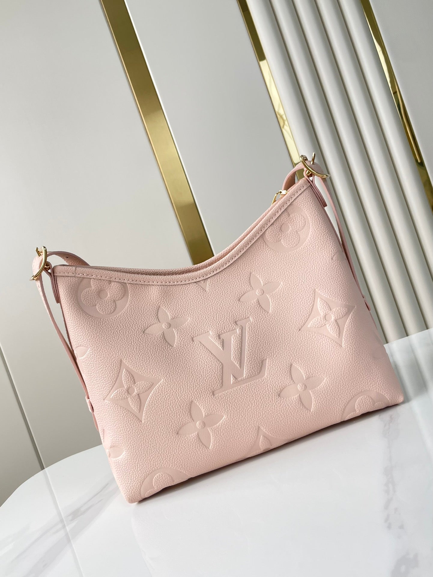 CARRYALL 29 IN LIGHT PINK MONOGRAM EMPREINTE LEATHER