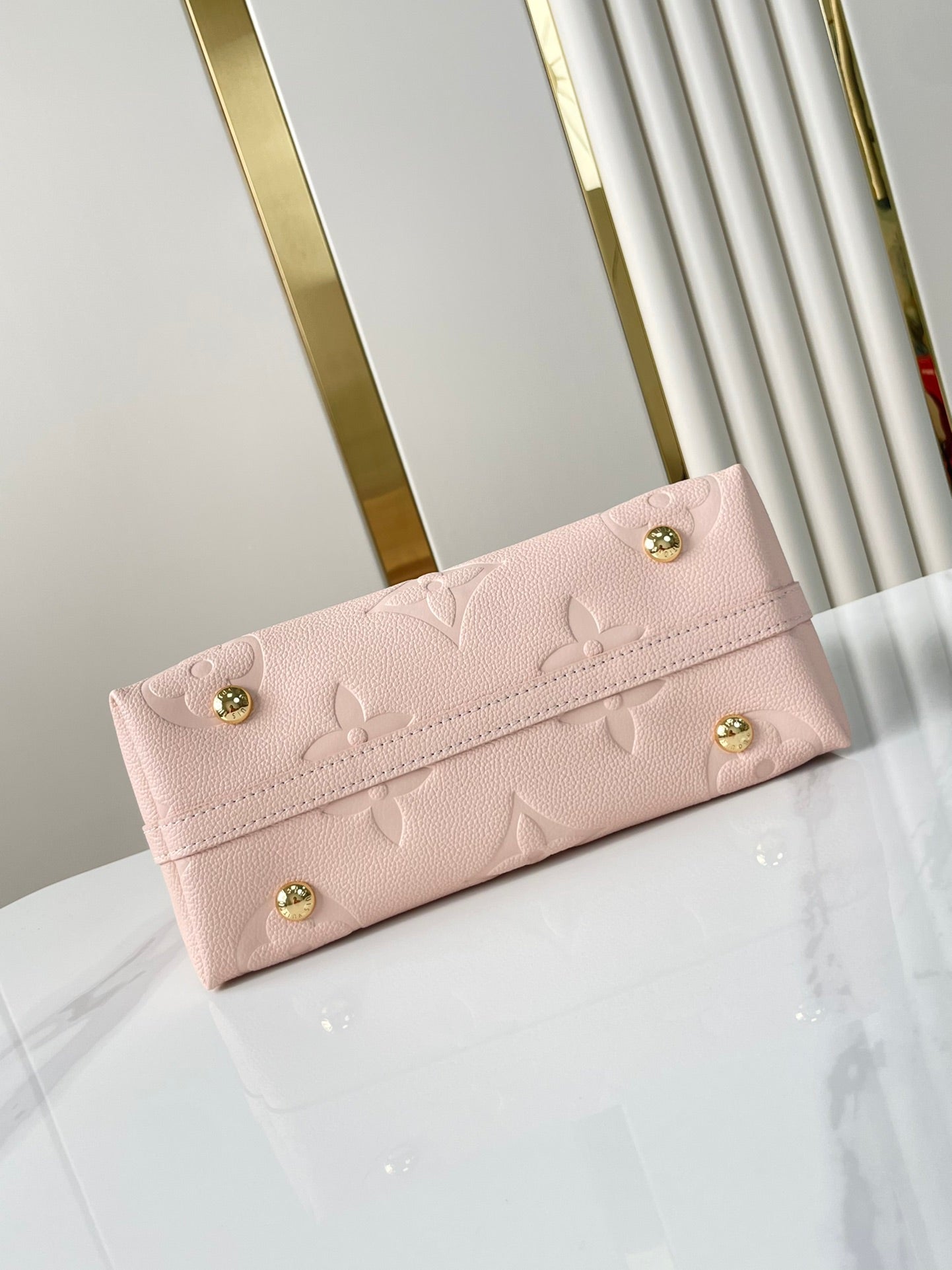 CARRYALL 29 IN LIGHT PINK MONOGRAM EMPREINTE LEATHER