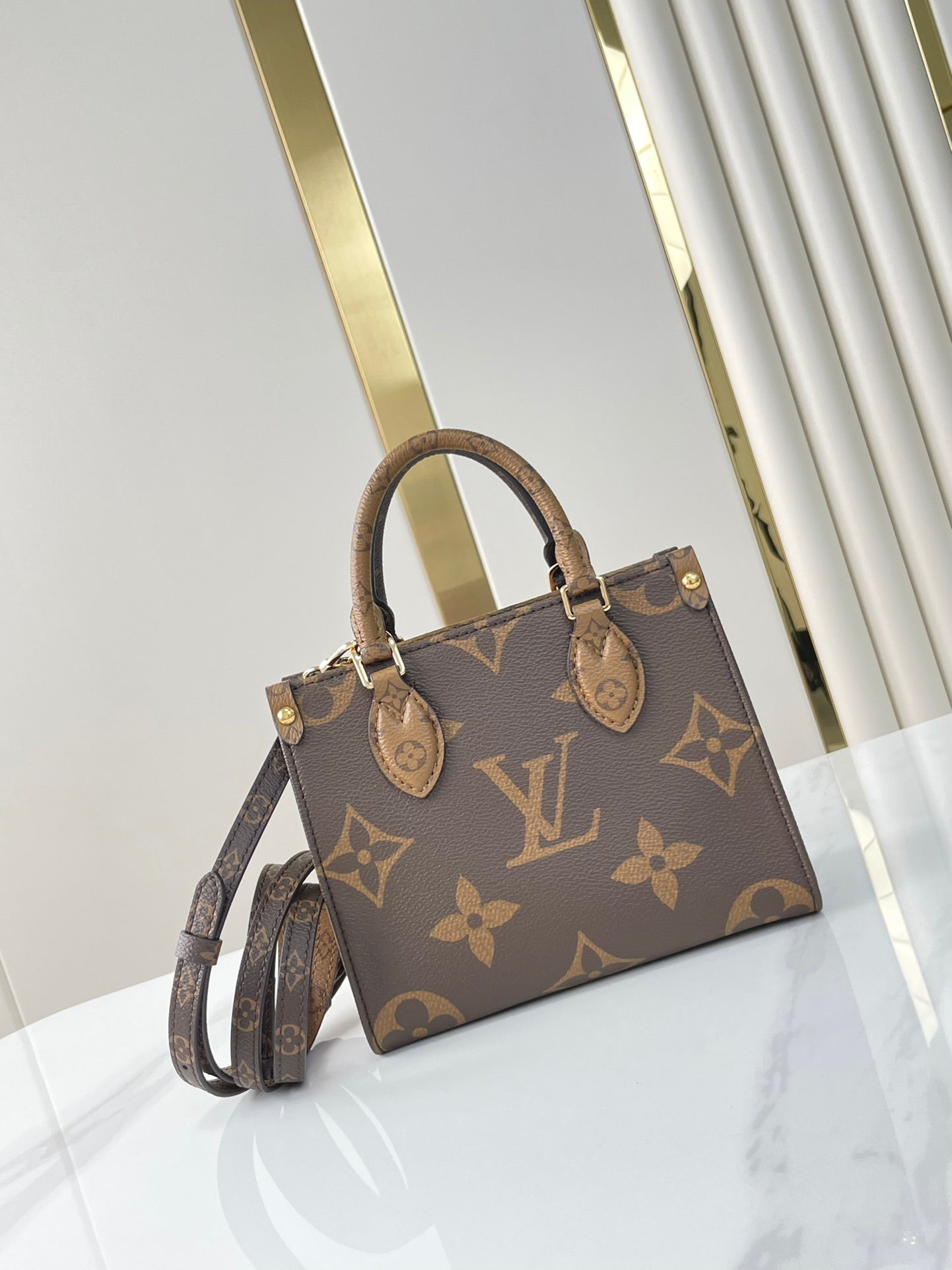 ONTHEGO BB 18 IN BROWN MONOGRAM AND MONOGRAM REVERSE CANVAS