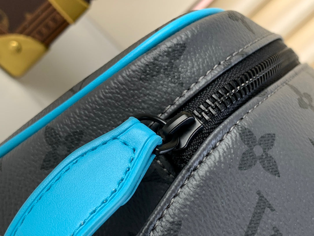 DOPP KIT 28 IN GUN METAL MONOGRAM ECLIPSE CANVAS AND TURQUOISE CALFSKIN TRIM