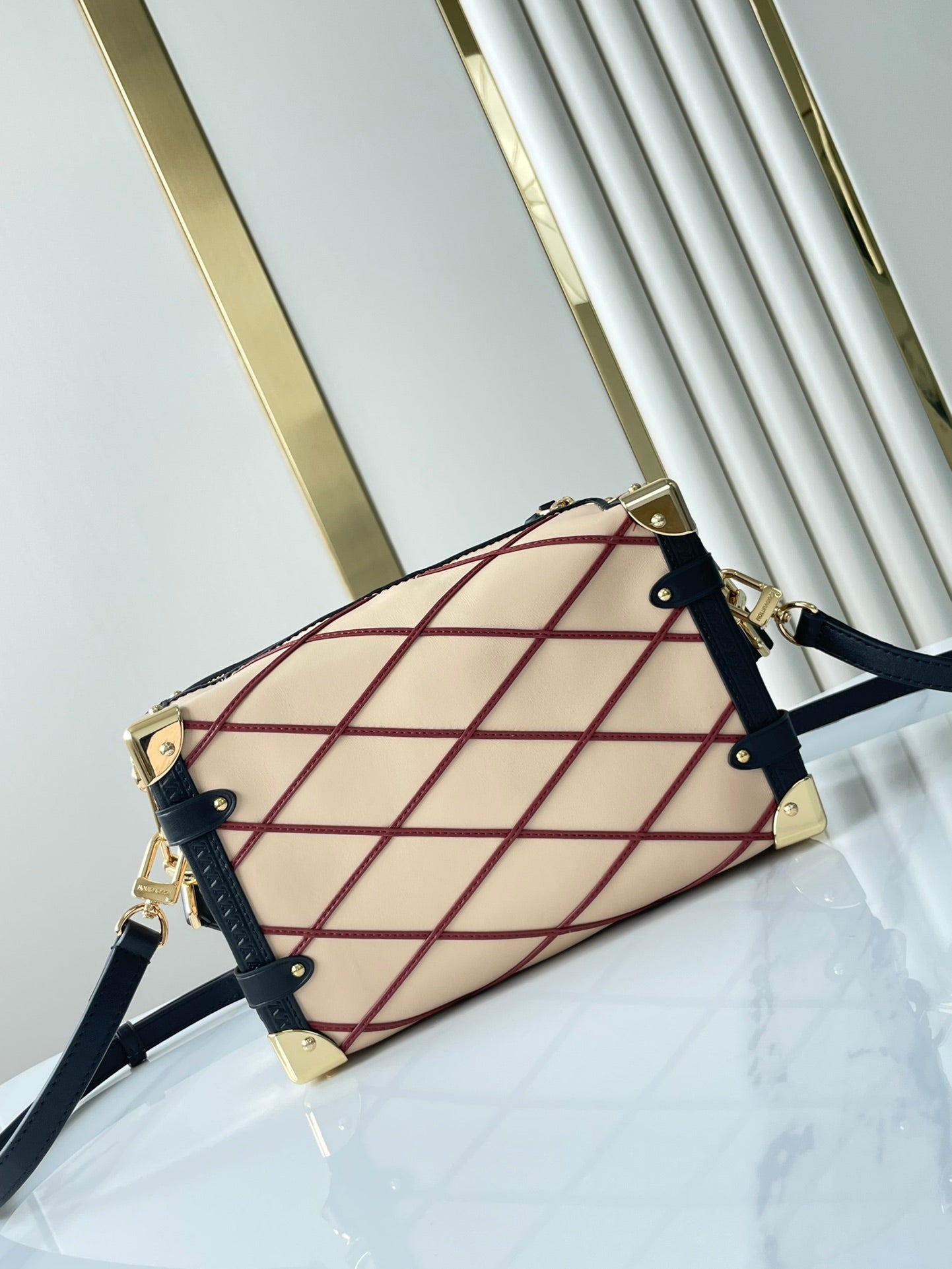 SIDE TRUNK 21 IN BEIGE RED LAMBSKIN WITH CRISS CROSS PATTERN GOLD HARDWARE