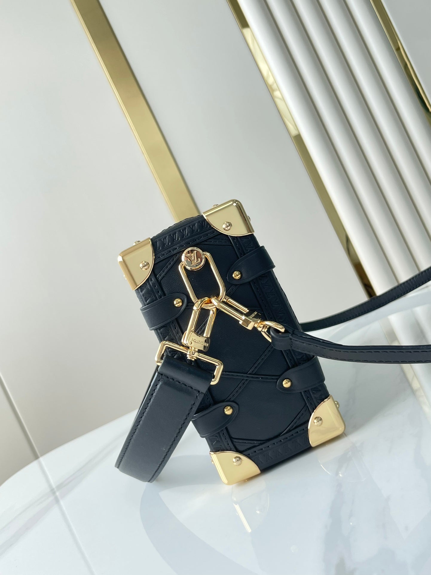 SIDE TRUNK 21 IN BLACK LAMBSKIN WITH CRISS CROSS PATTERN GOLD HARDWARE