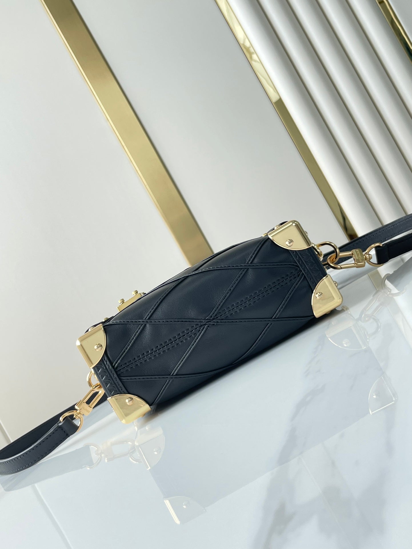 SIDE TRUNK MINI 18 IN BLACK LAMBSKIN WITH CRISS CROSS PATTERN GOLD HARDWARE