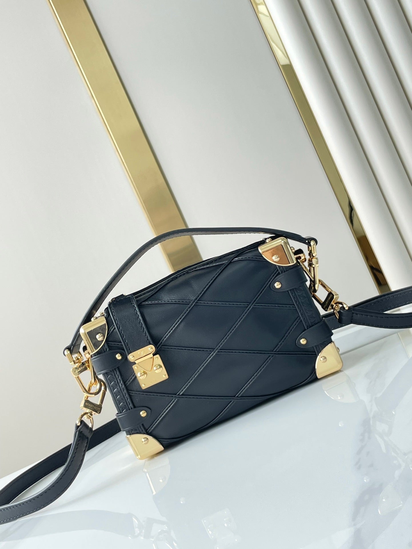 SIDE TRUNK MINI 18 IN BLACK LAMBSKIN WITH CRISS CROSS PATTERN GOLD HARDWARE