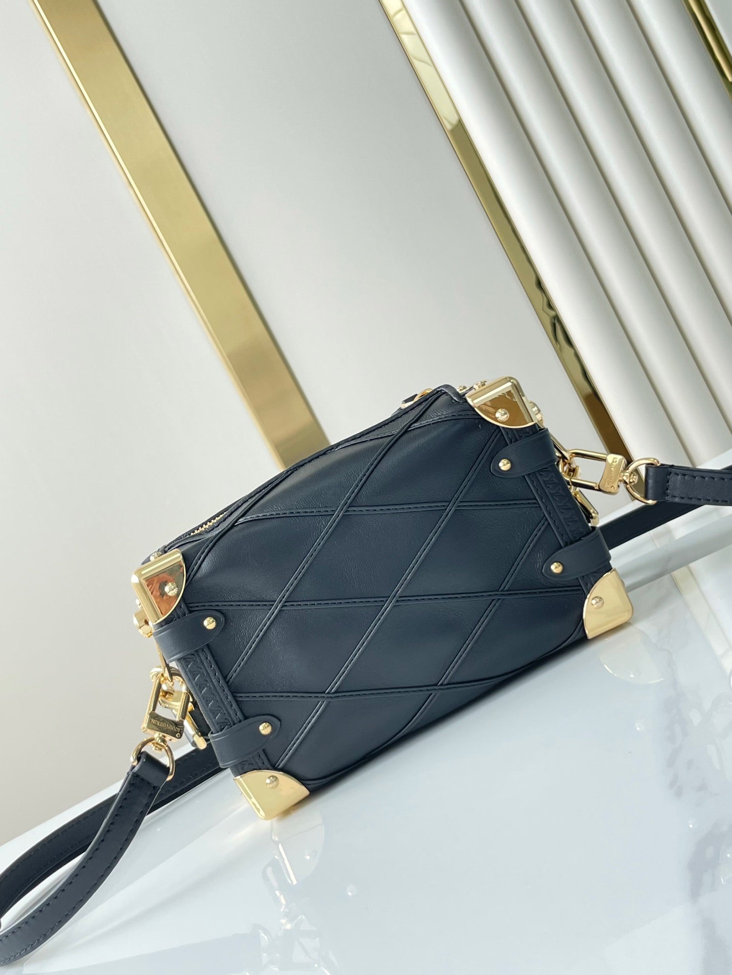 SIDE TRUNK MINI 18 IN BLACK LAMBSKIN WITH CRISS CROSS PATTERN GOLD HARDWARE