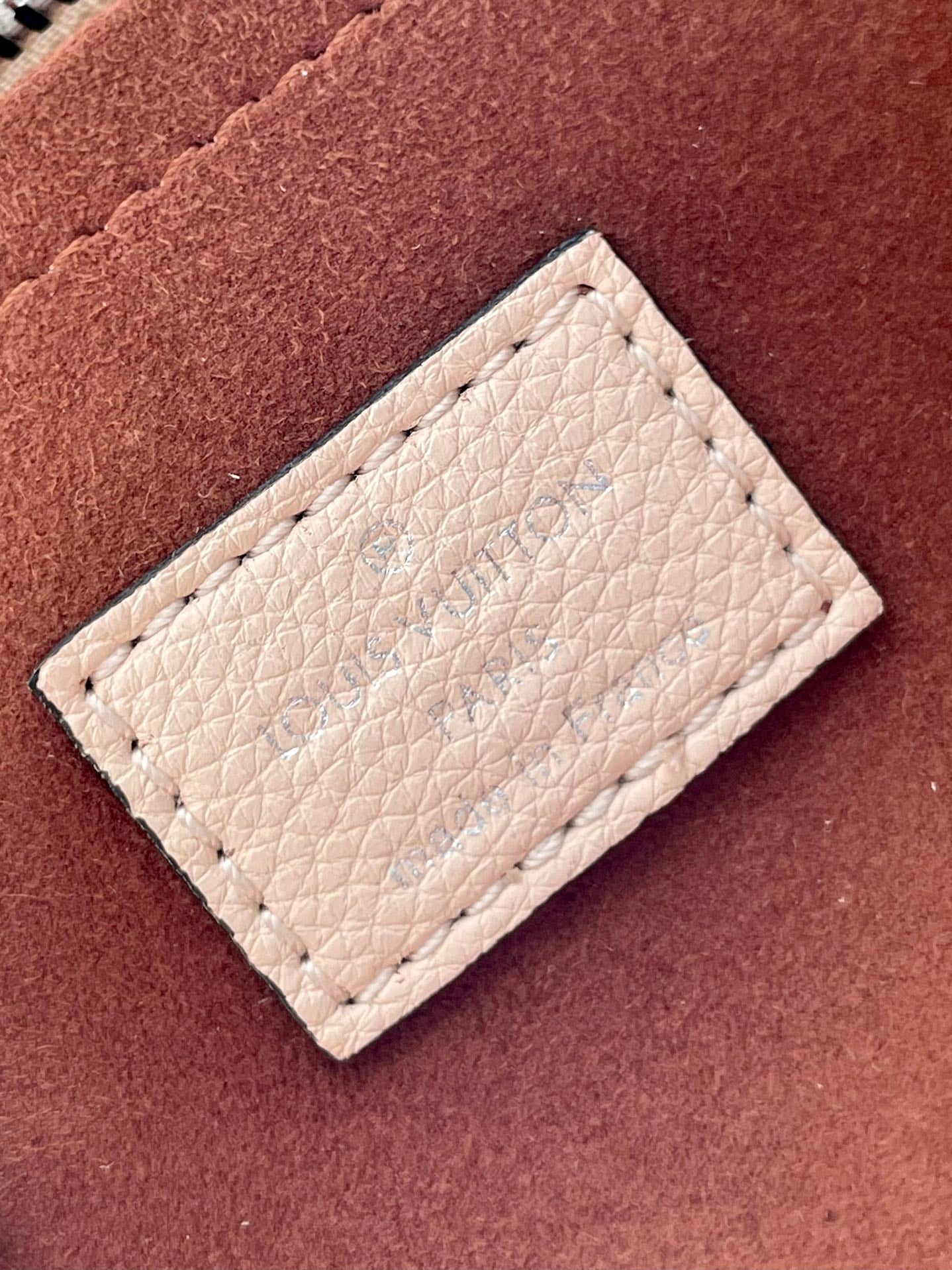 HAND IT ALL PM 29 IN BEIGE MONOGRAM PERFORATE CALFSKIN SILVER HARDWARE