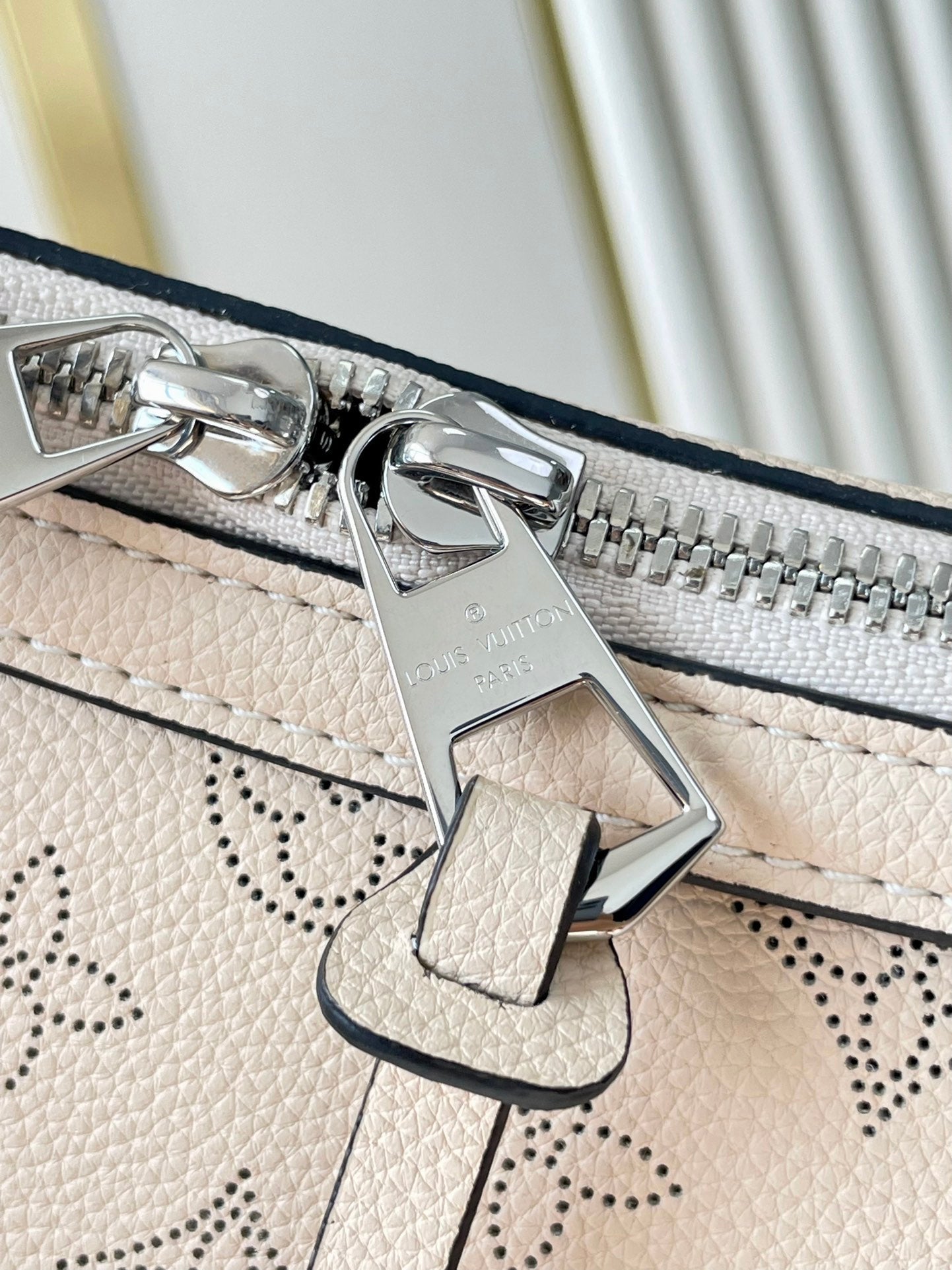 HAND IT ALL PM 29 IN BEIGE MONOGRAM PERFORATE CALFSKIN SILVER HARDWARE