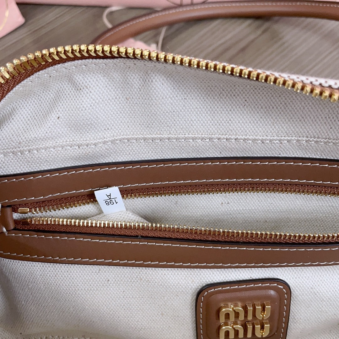 BOWLING BAG 28 IN WHITE CANVAS AND BROWN CALFSKIN TRIM