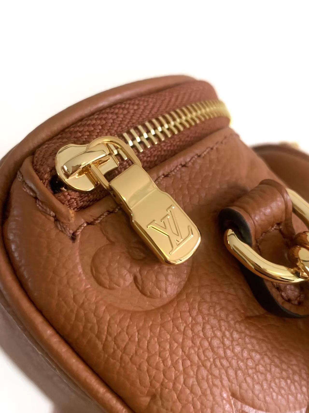 MINI BUMBAG 17 IN COGNAC MONOGRAM EMPREINTE LEATHER GOLD HARDWARE