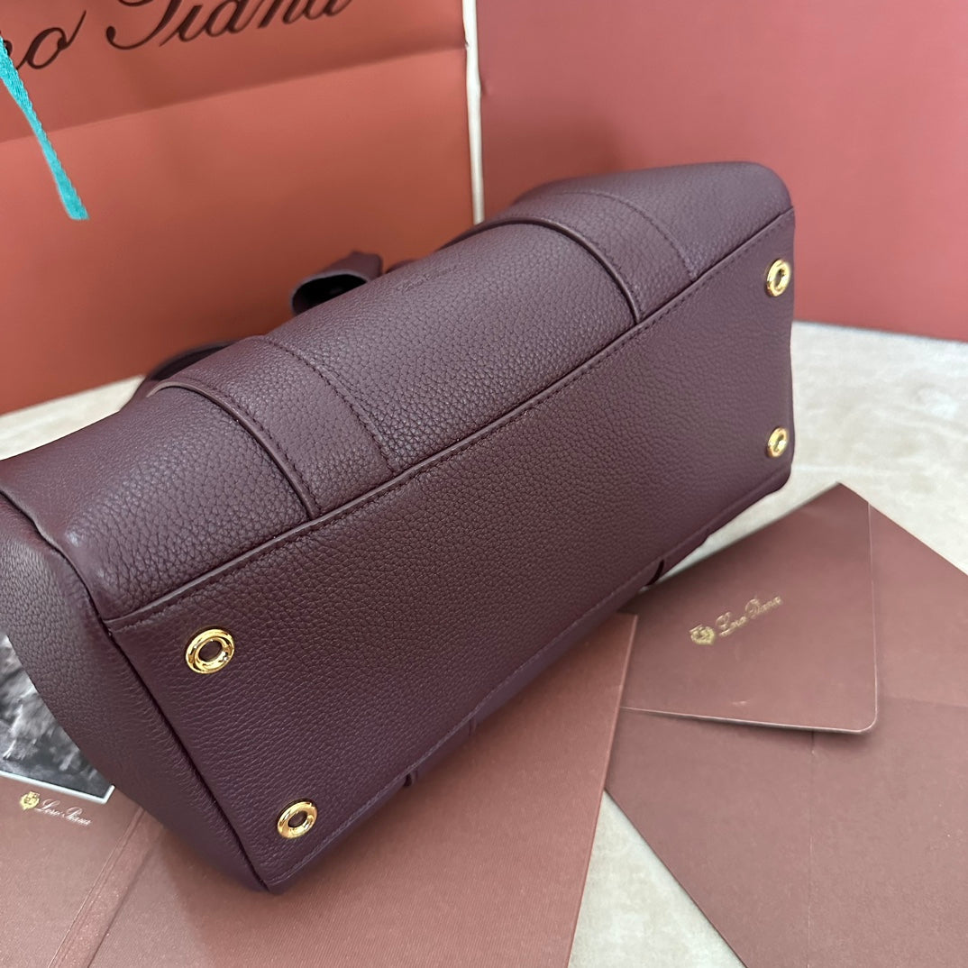 LOOM BAG 25 IN WINE PURPLE CALFSKIN WITH GOLD HARDWARE