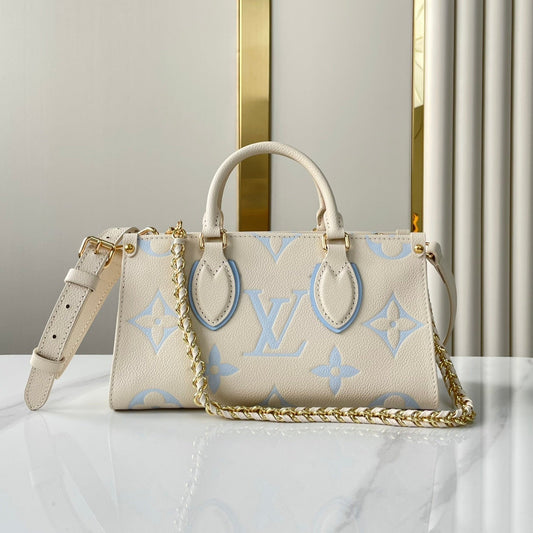 ONTHEGO 25 IN CREAM BLUE CALFSKIN GOLD HARDWARE