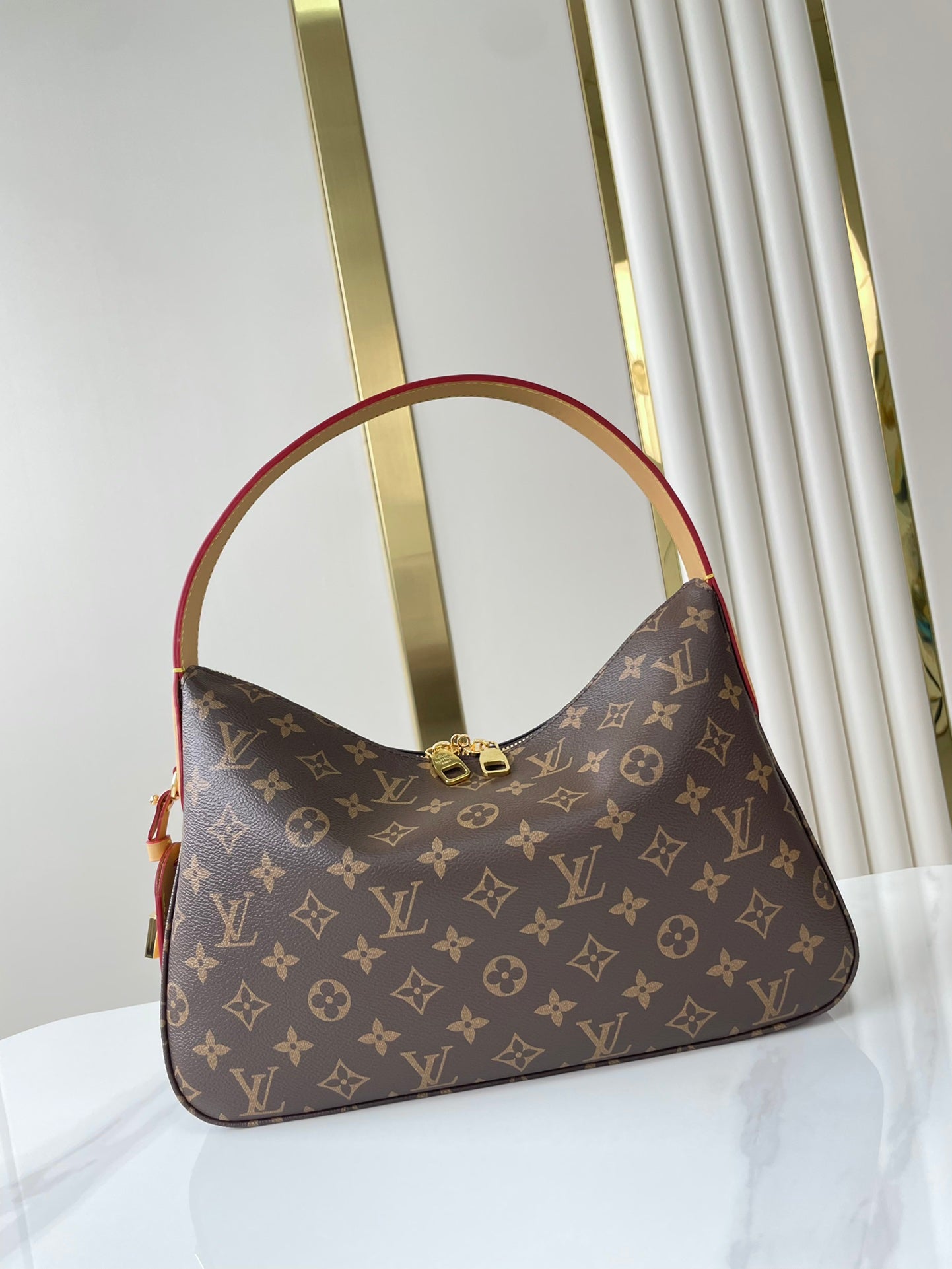 SLOUCHY PM 33 IN BROWN MONOGRAM CANVAS