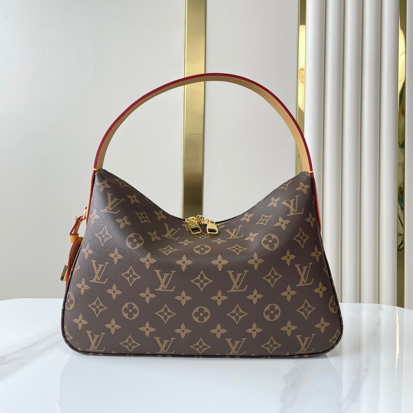 SLOUCHY PM 33 IN BROWN MONOGRAM CANVAS