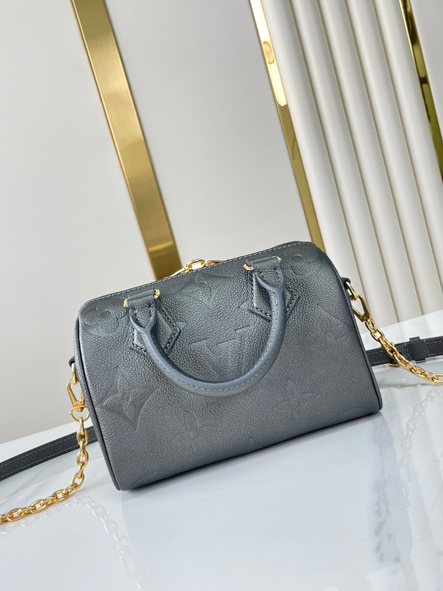 SPEEDY BANDOULIÈRE 20 IN GUN METAL MONOGRAM EMPREINTE GOLD HARDWARE