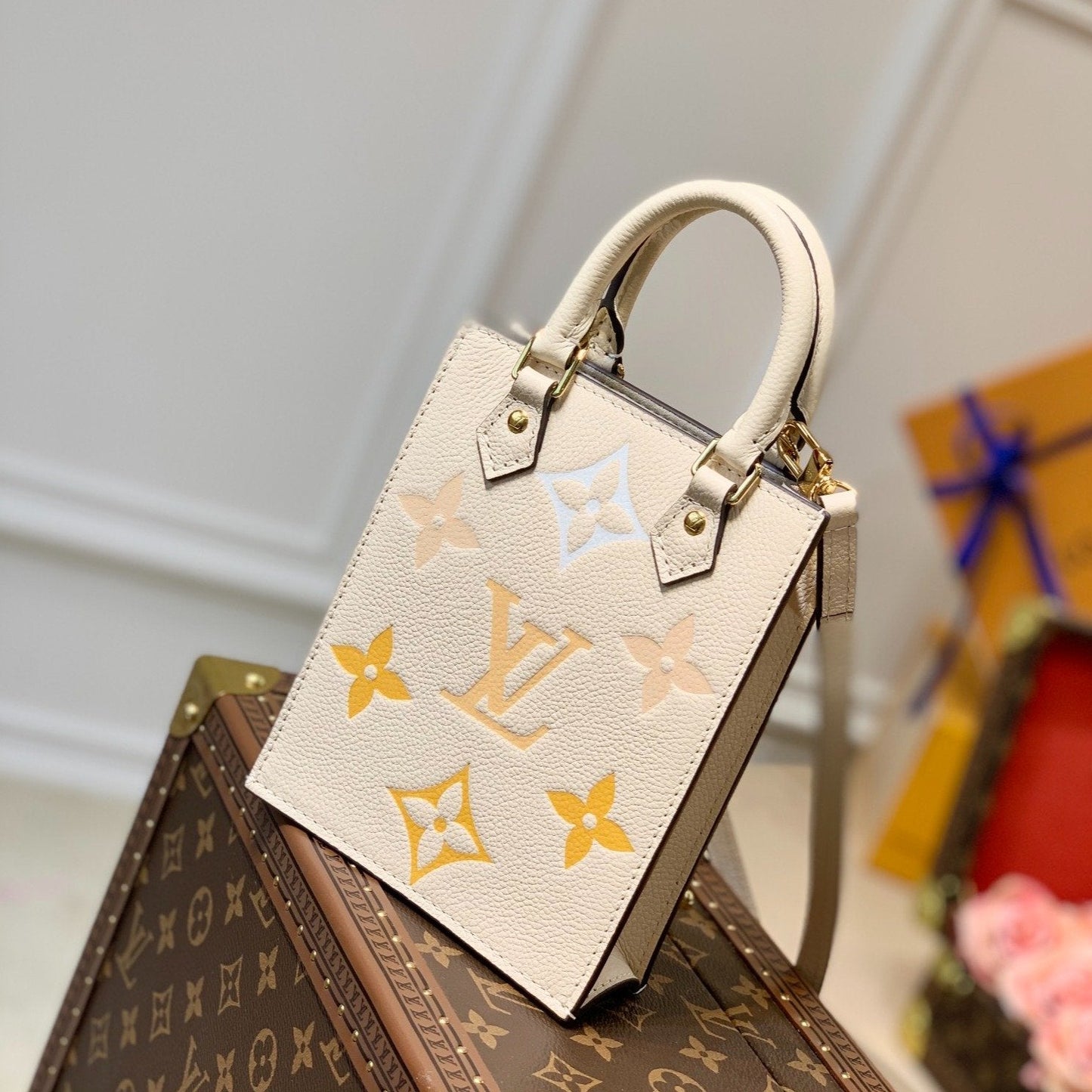 LV PETIT SAC PLAT CREAM MONOGRAM EMPREINTE COWHIDE LEATHER