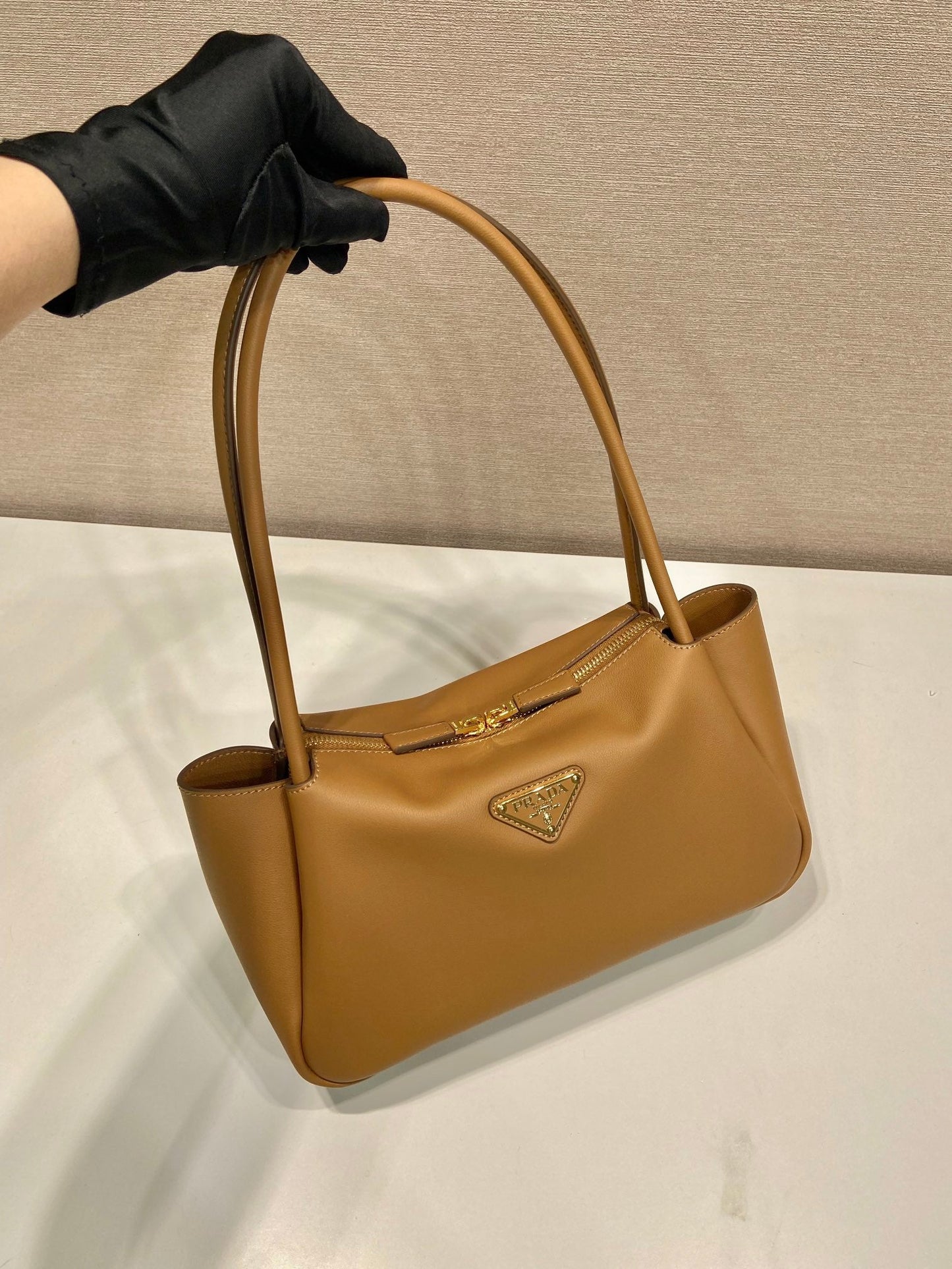 PRA 28 LARGE BEIGE CALFSKIN HANDBAG