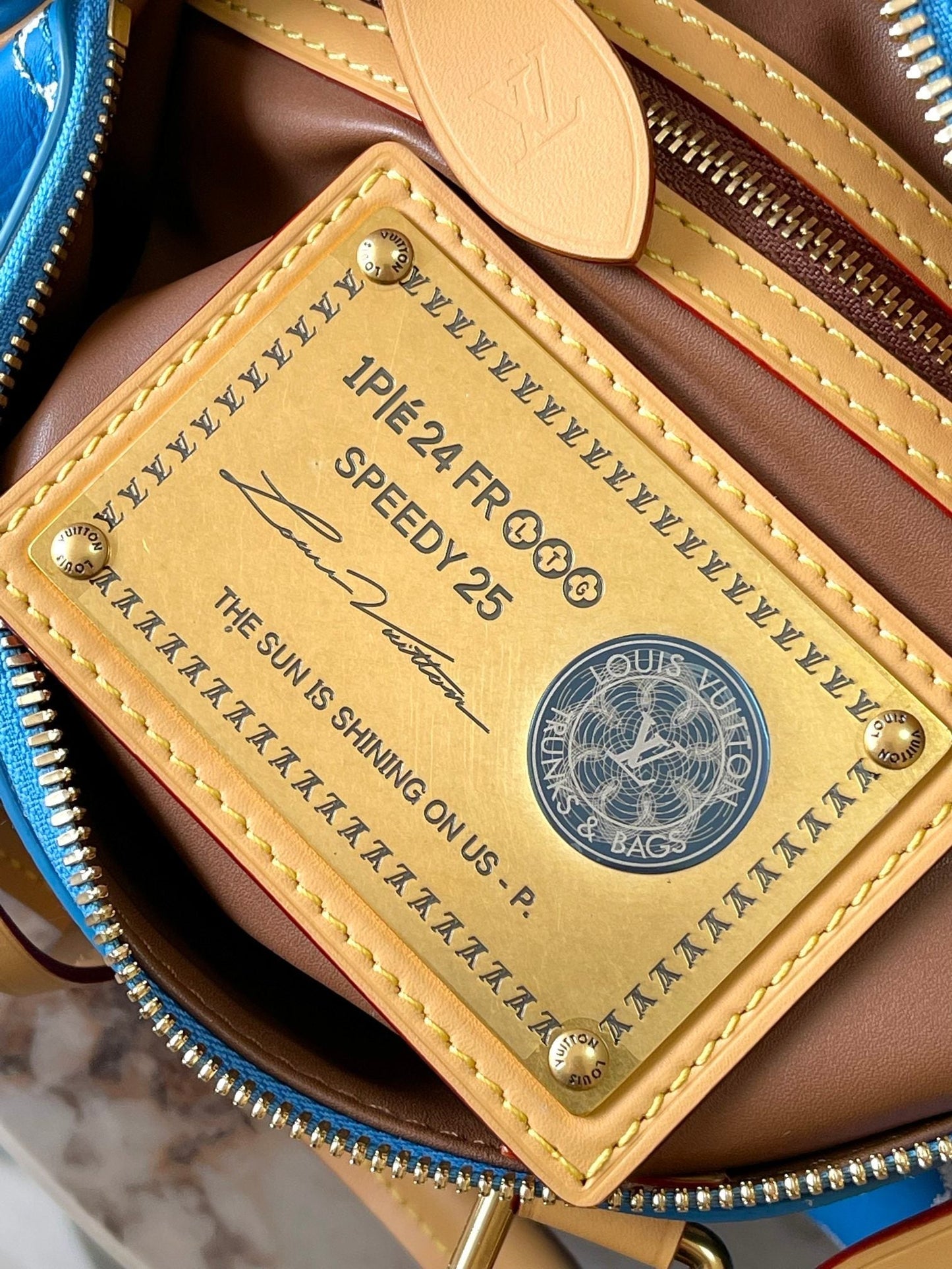 SPEEDY P9 BANDOULIÈRE 25 IN BLUE MONOGRAM CANVAS GOLD HARDWARE