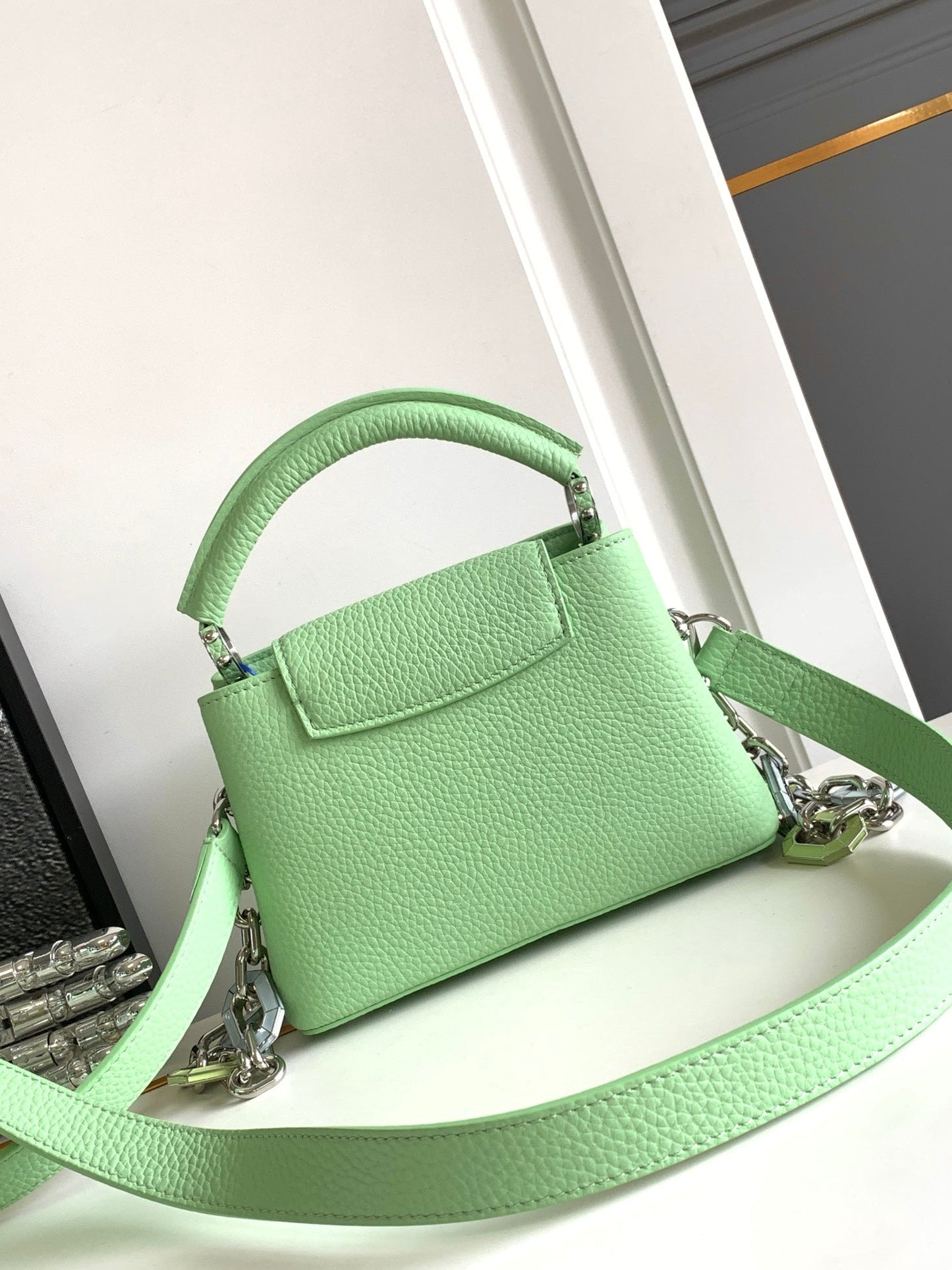 CAPUCINES MINI 21 IN LIGHT GREEN TAURILLON SILVER HARDWARE