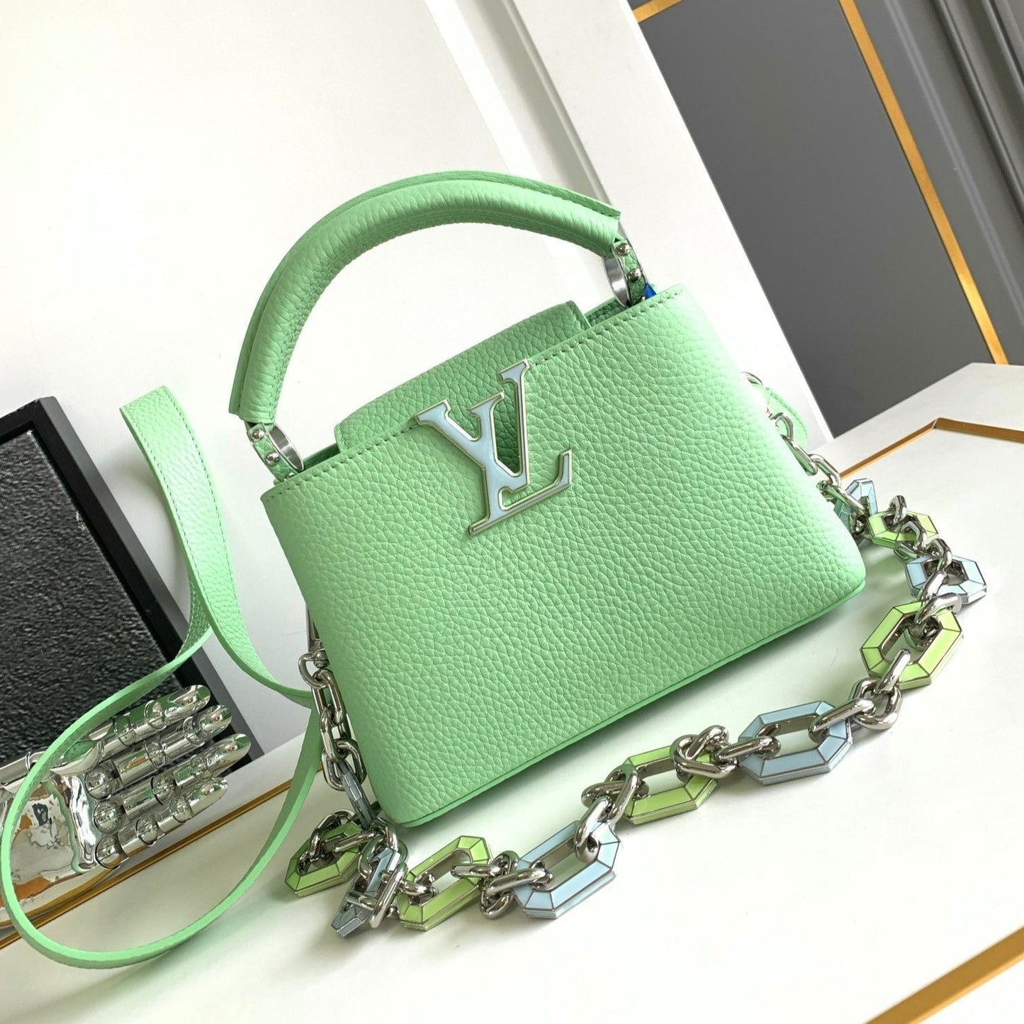 CAPUCINES MINI 21 IN LIGHT GREEN TAURILLON SILVER HARDWARE