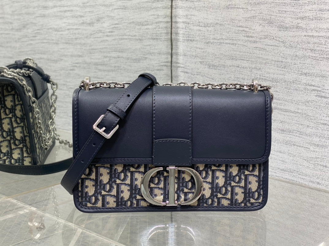 MONTAIGNE EAST-WEST 25 BAG WITH CHAIN IN NAVY BLUE LAMBSKIN AND MONOGRAM JACQUARD