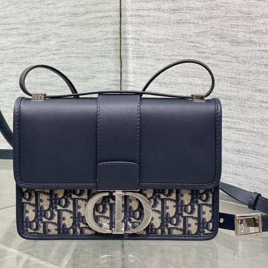 MONTAIGNE EAST-WEST 24 BAG WITH CHAIN IN NAVY BLUE LAMBSKIN AND MONOGRAM JACQUARD