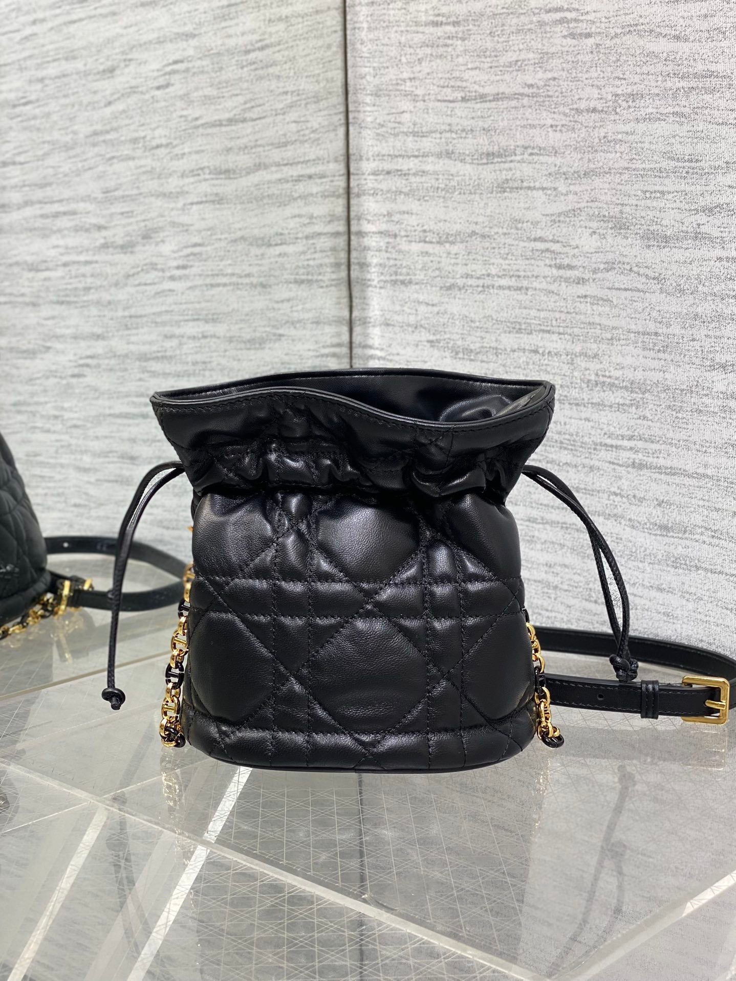 MONTAIGNE MINI 18 BUCKET BAG WITH DRAWSTRING IN BLACK LAMBSKIN