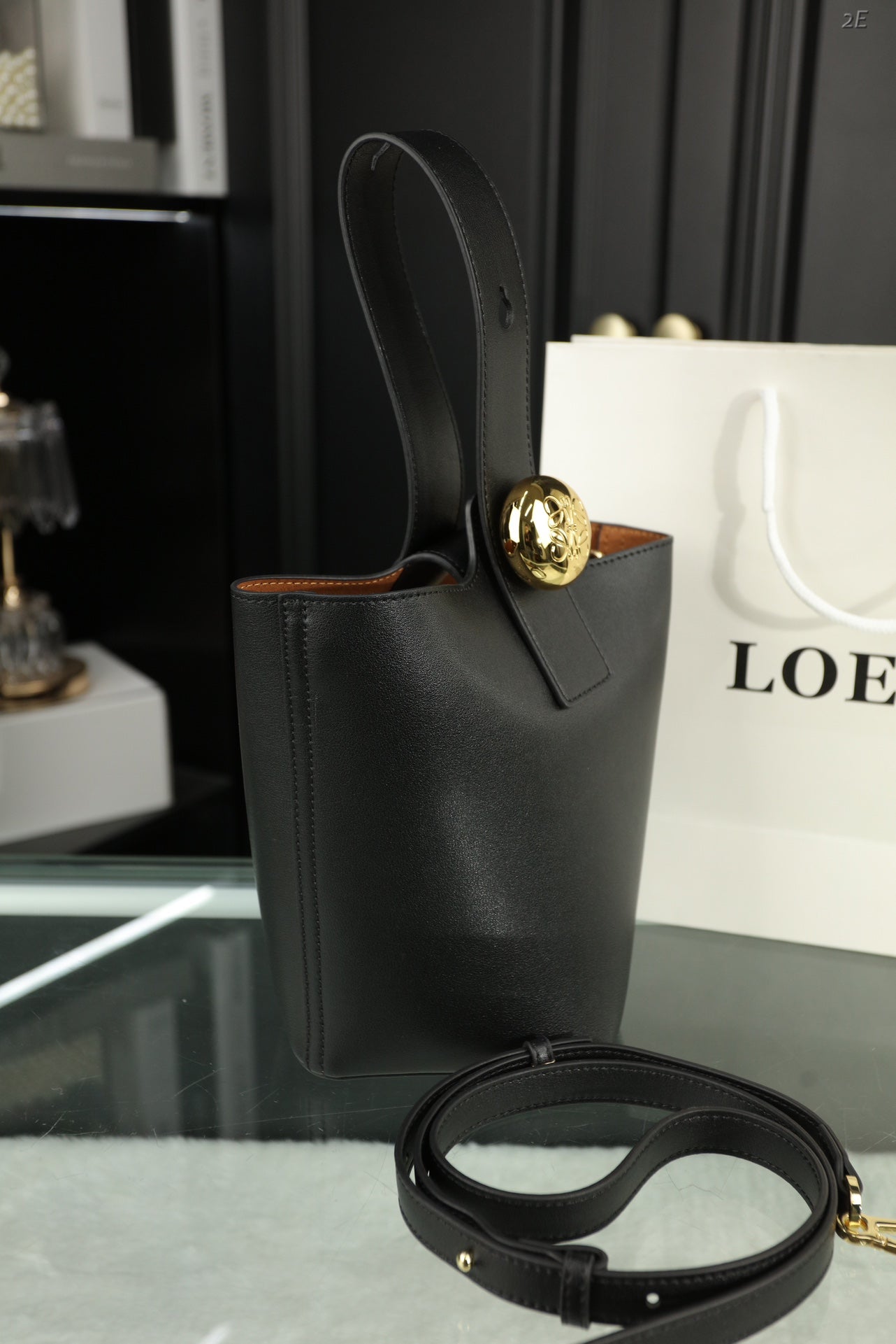 LOE MINI 19 PEBBLE BUCKET IN BLACK MELLOW CALFSKIN