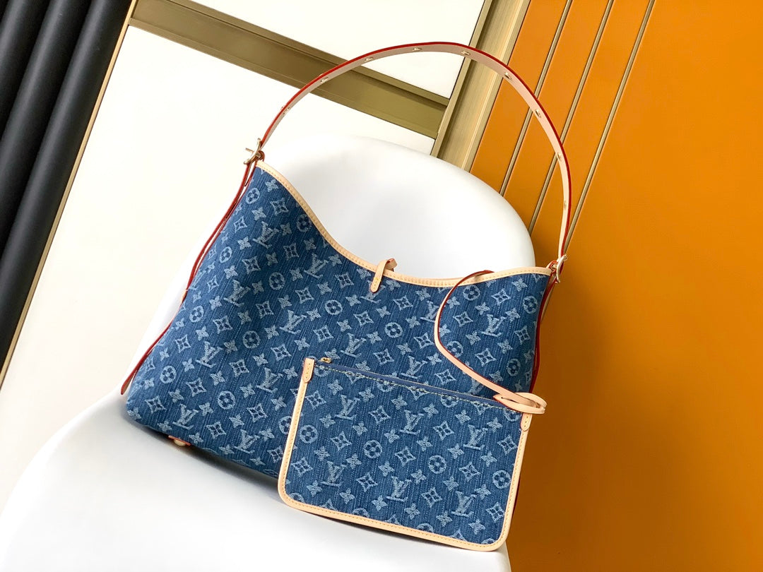 CARRYALL MM 39 IN BLUE MONOGRAM DENIM