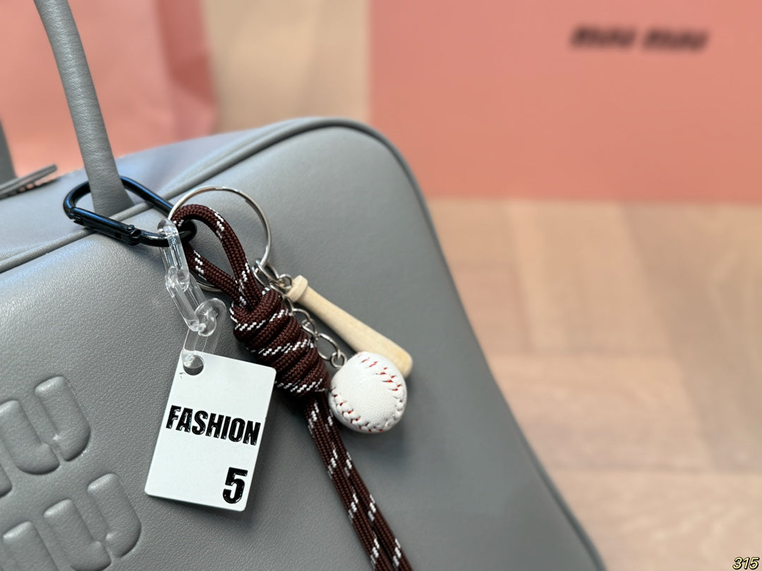 BEAU BAG 33 IN GRAY CALFSKIN WITH BASEBALL CHARM